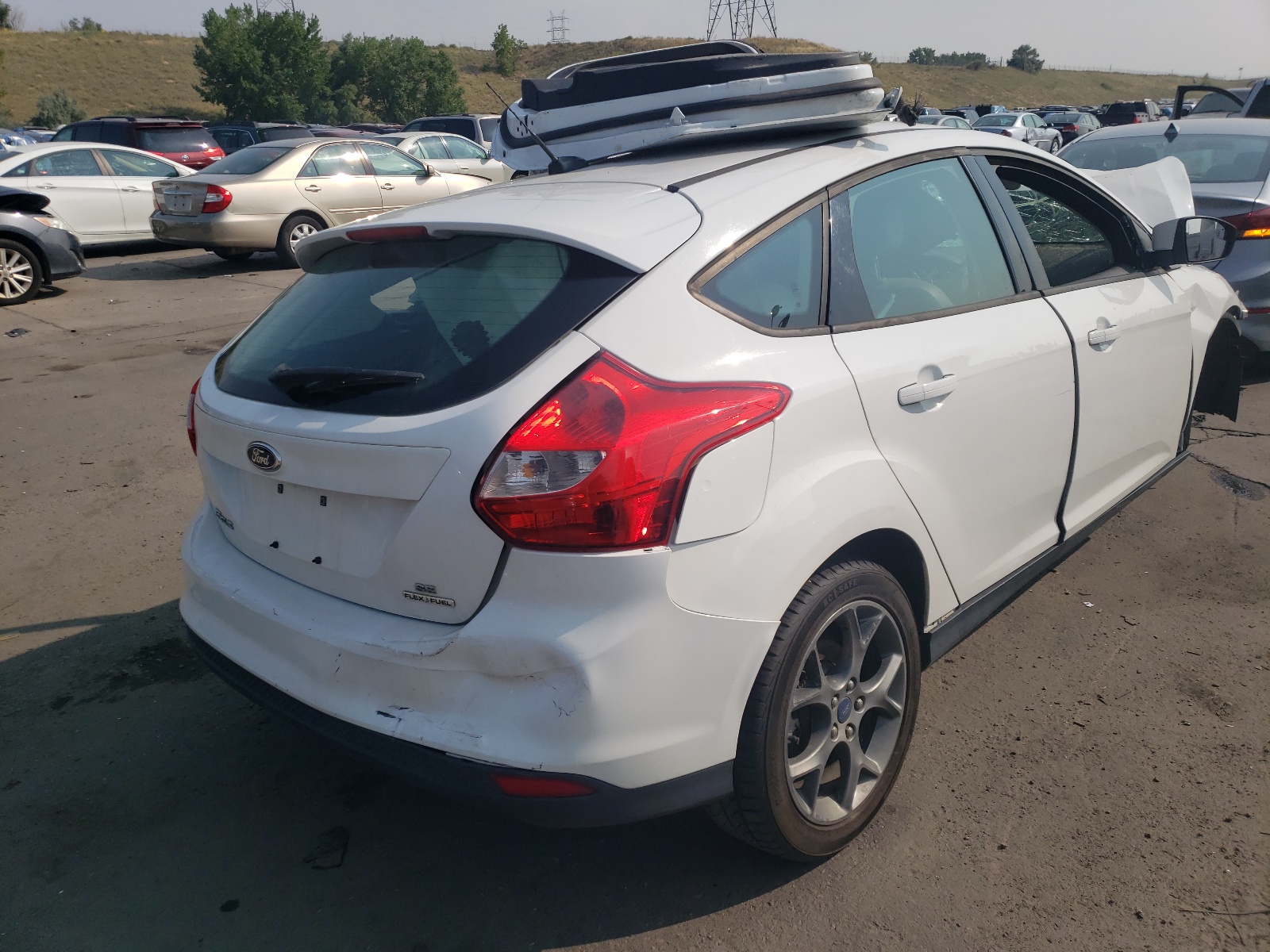 Zdjęcie 4 z aukcji – 2013 FORD FOCUS SE z VIN 1FADP3K29DL152687