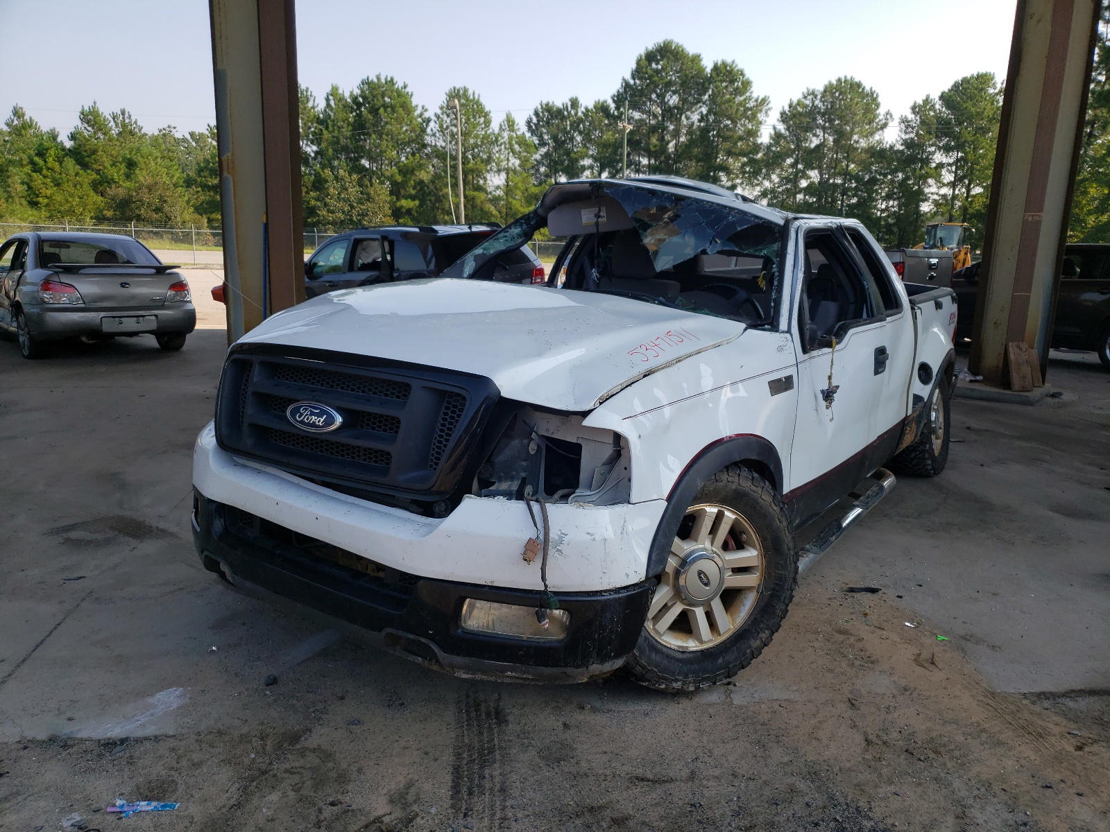 Photo 2 from auction – 2005 FORD F150 with VIN 1FTPX04535KB99654