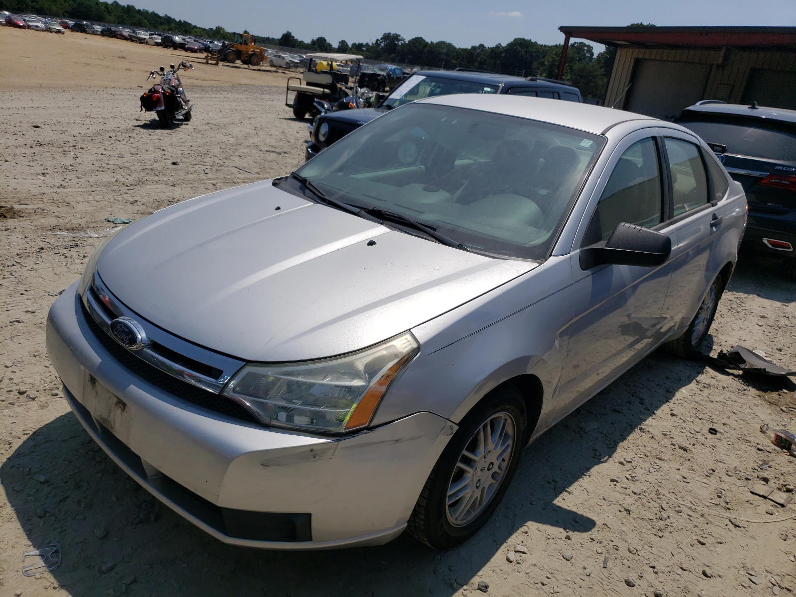 Photo 2 from auction – 2011 FORD FOCUS SE with VIN 1FAHP3FN3BW118956