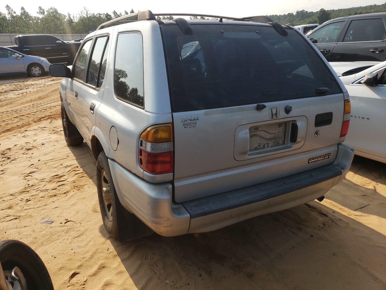 Photo 3 from auction – 1999 HONDA PASSPORT E with VIN 4S6CK58W0X4408517