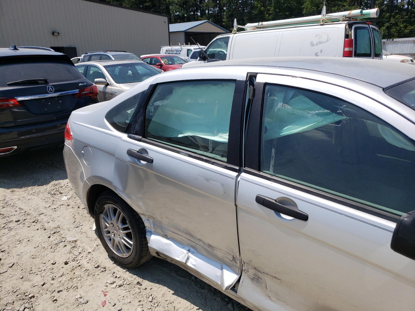 Photo 9 from auction – 2011 FORD FOCUS SE with VIN 1FAHP3FN3BW118956