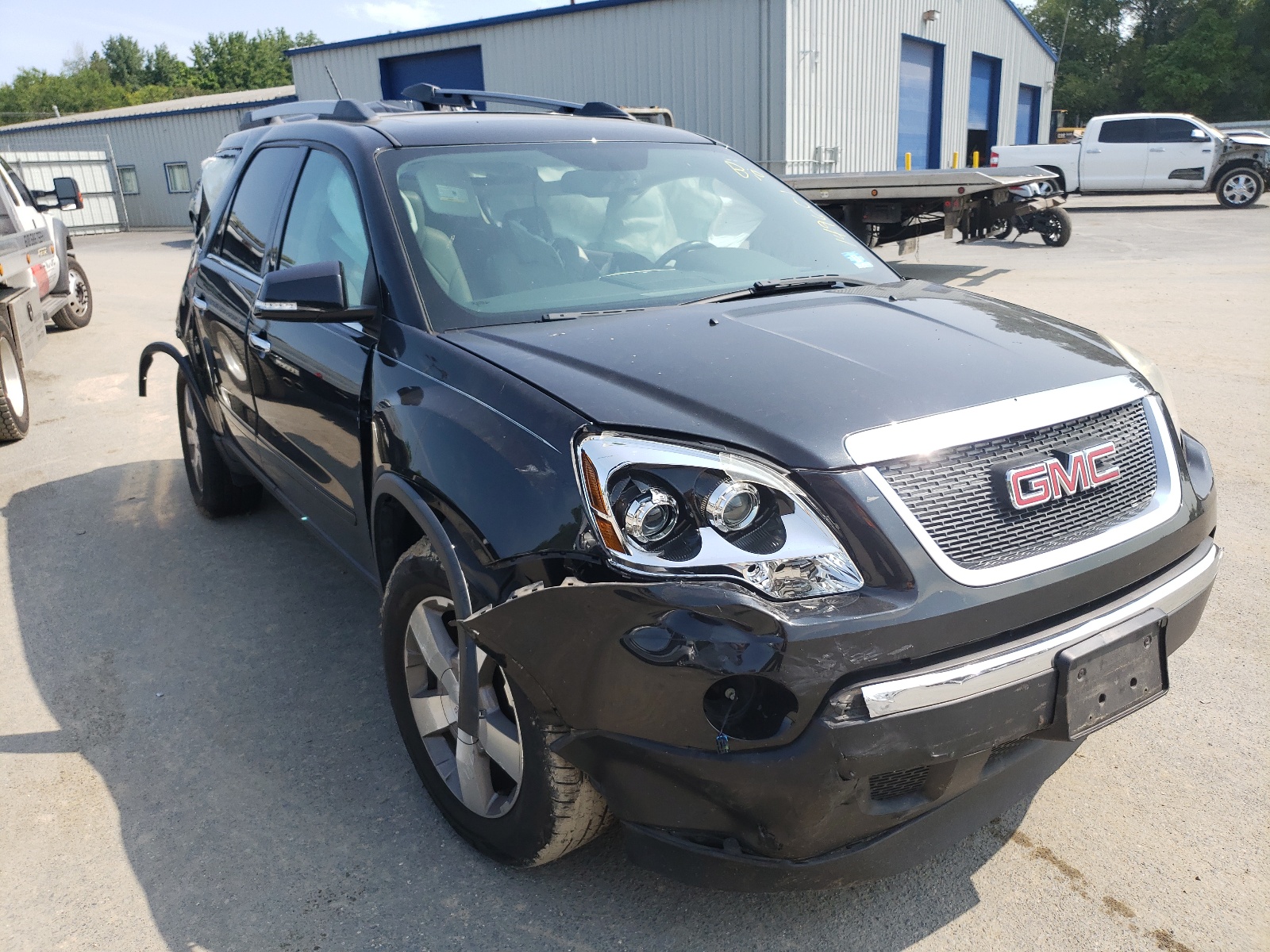 GMC ACADIA SLT 2011 with VIN 1GKKRRED1BJ149601 - Photo from auction