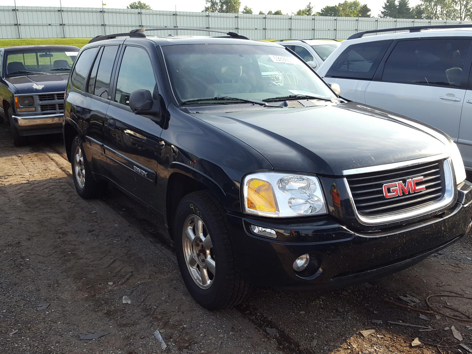 GMC ENVOY 2002 with VIN 1GKDT13S822441642 - Photo from auction