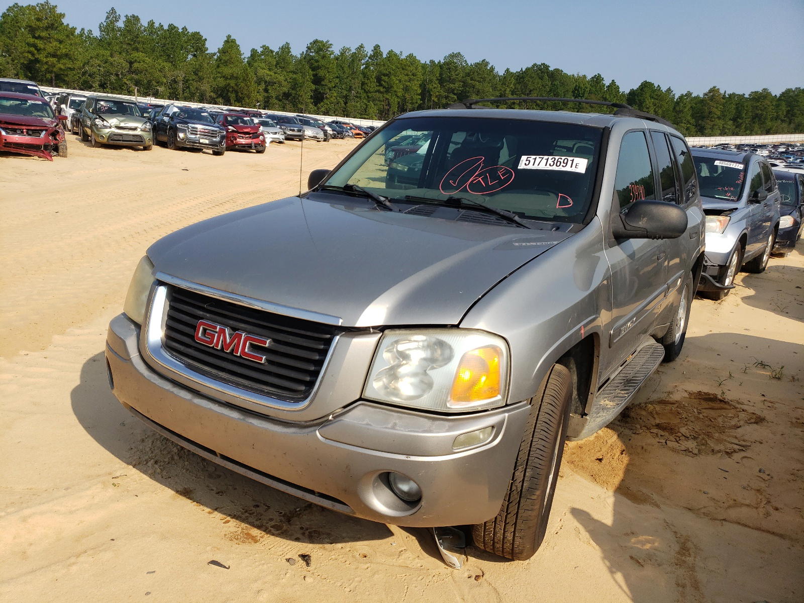 Photo 2 from auction – 2003 GMC ENVOY with VIN 1GKDS13S732133303