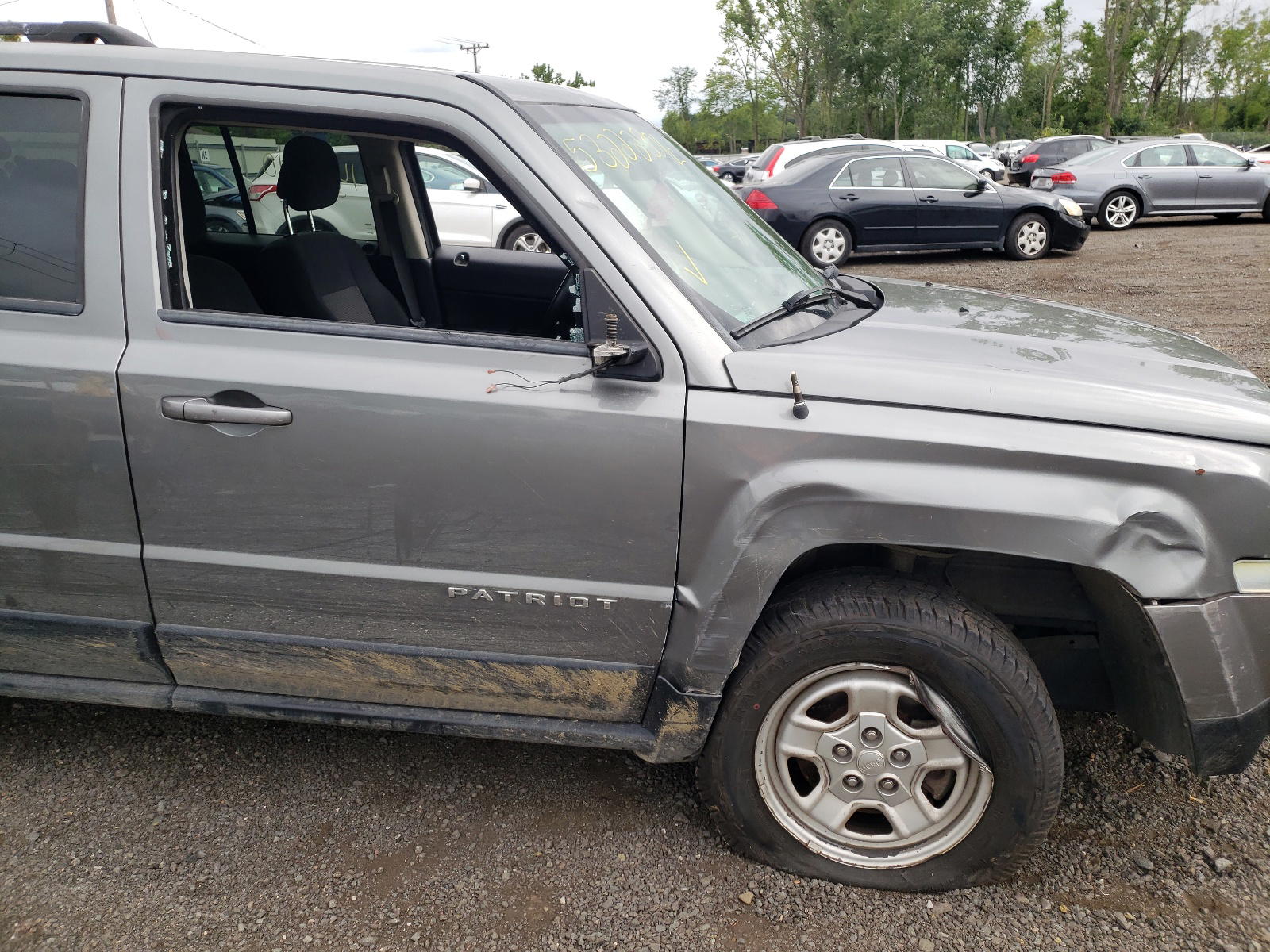 Photo 9 from auction – 2012 JEEP PATRIOT SP with VIN 1C4NJPBA5CD613603
