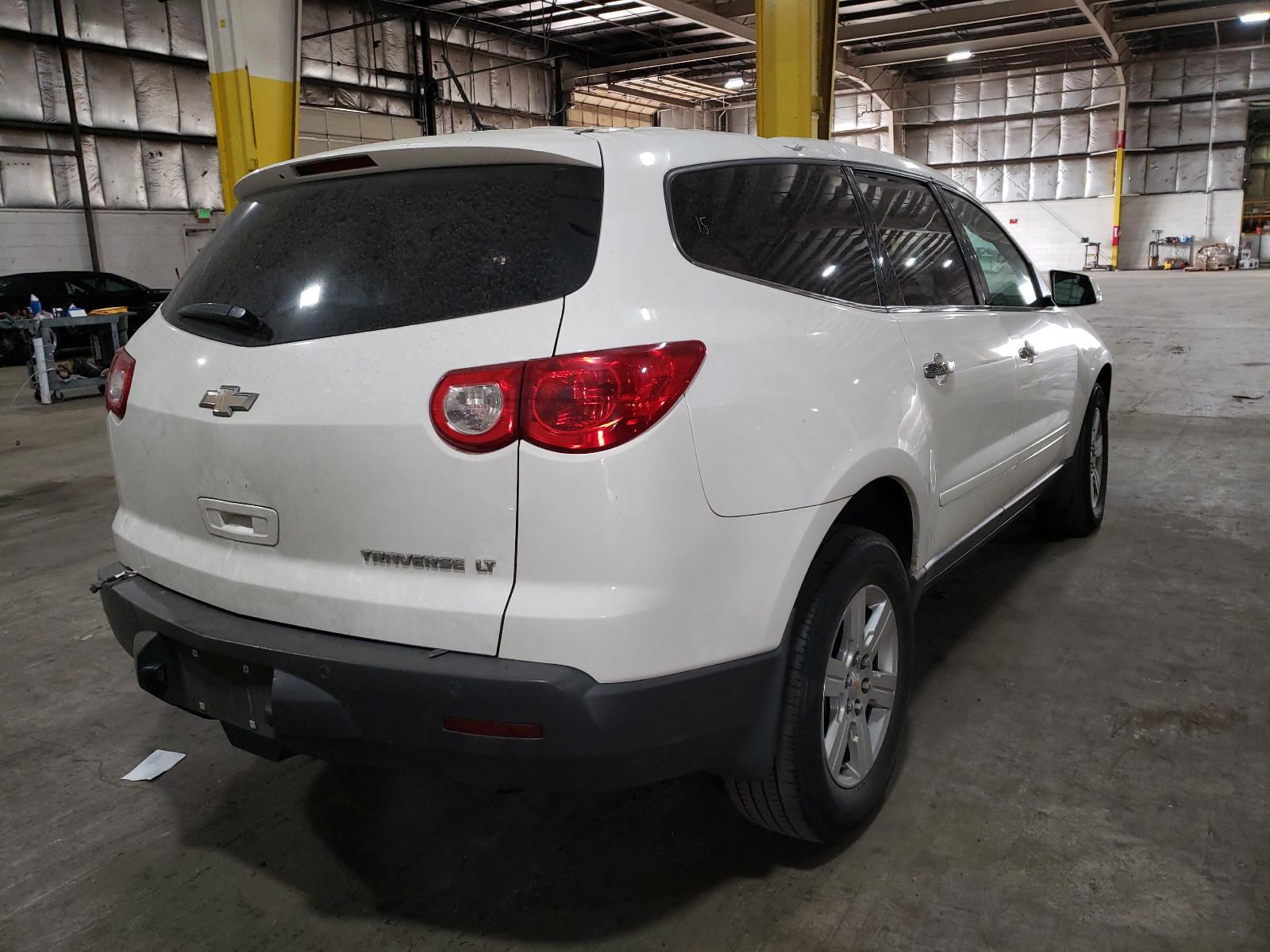 Photo 4 from auction – 2011 CHEVROLET TRAVERSE L with VIN 1GNKRGED8BJ199404