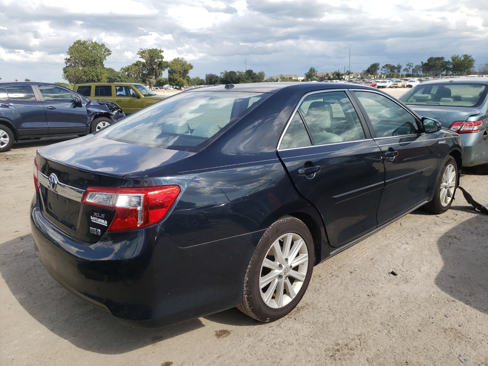 Photo 4 from auction – 2012 TOYOTA CAMRY HYBR with VIN 4T1BD1FK5CU058349