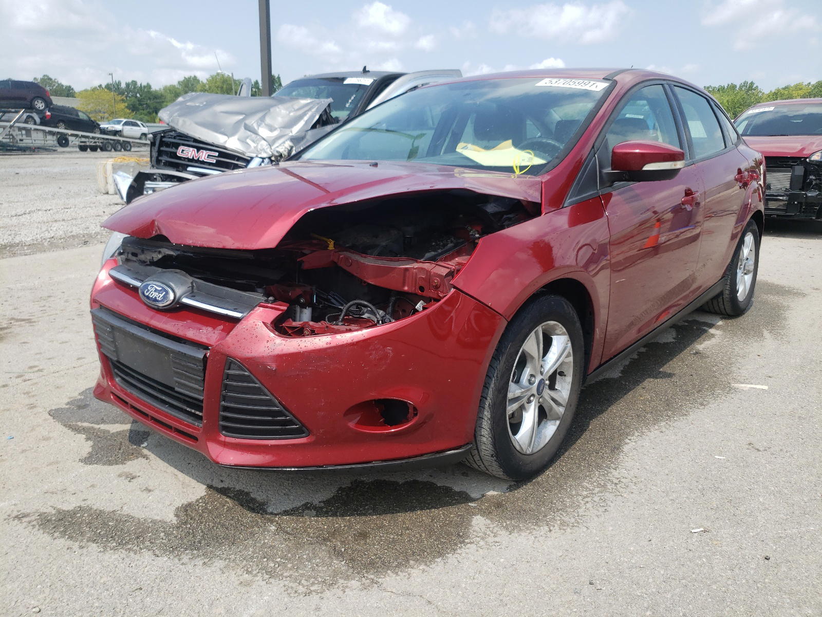 Photo 2 from auction – 2014 FORD FOCUS SE with VIN 1FADP3F20EL116477