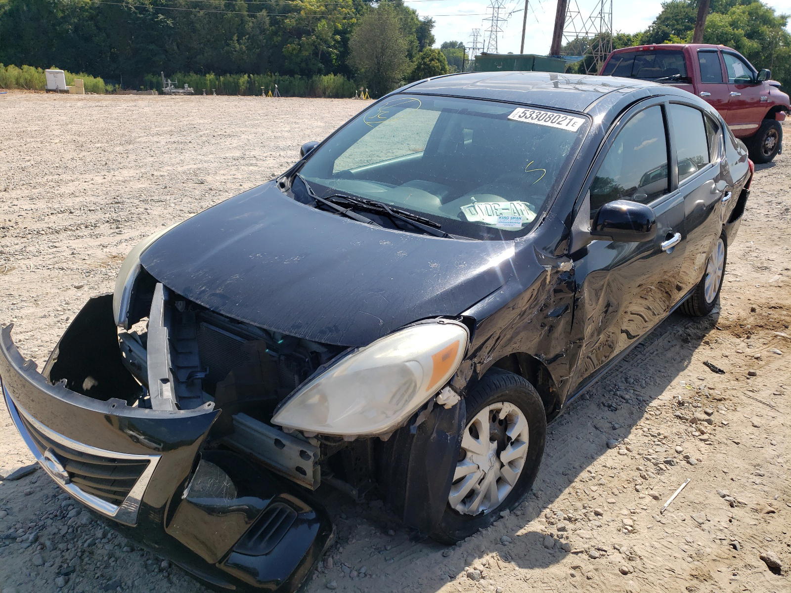 Photo 2 from auction – 2012 NISSAN VERSA S with VIN 3N1CN7AP9CL804407