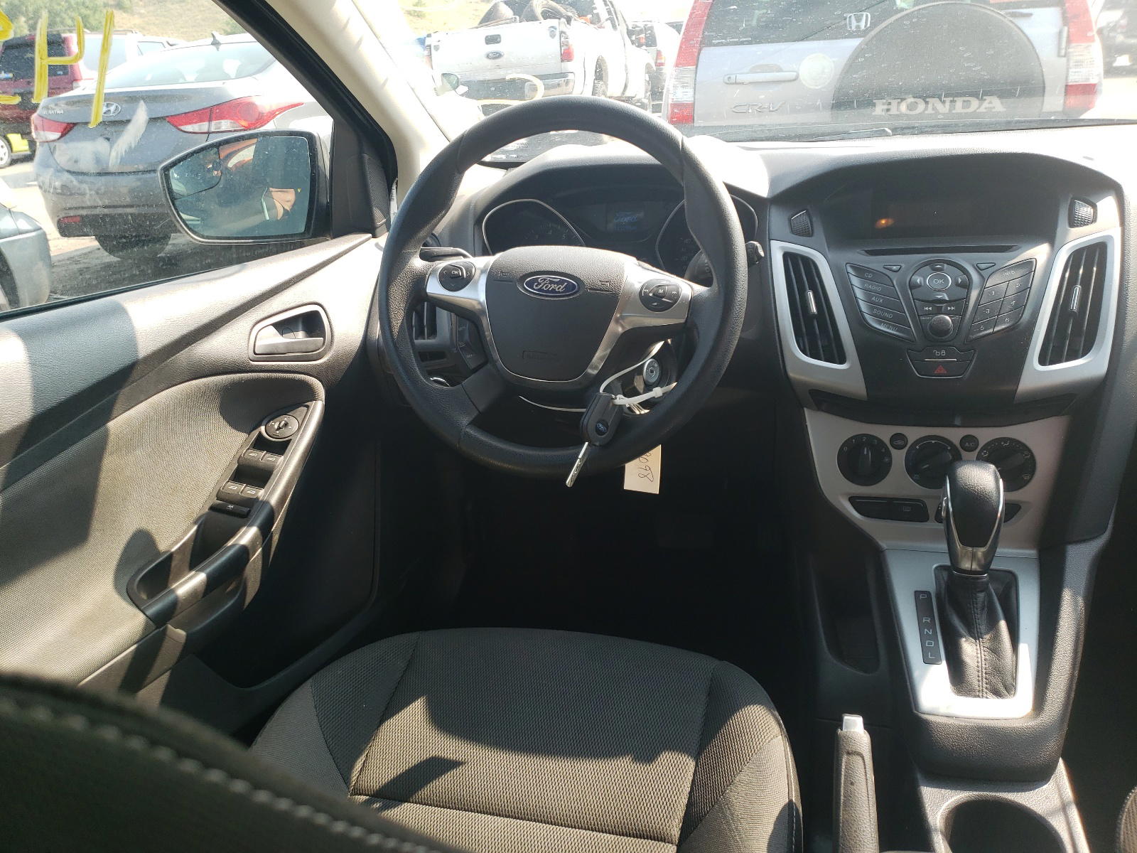 Photo 9 from auction – 2012 FORD FOCUS SE with VIN 1FAHP3K24CL373243