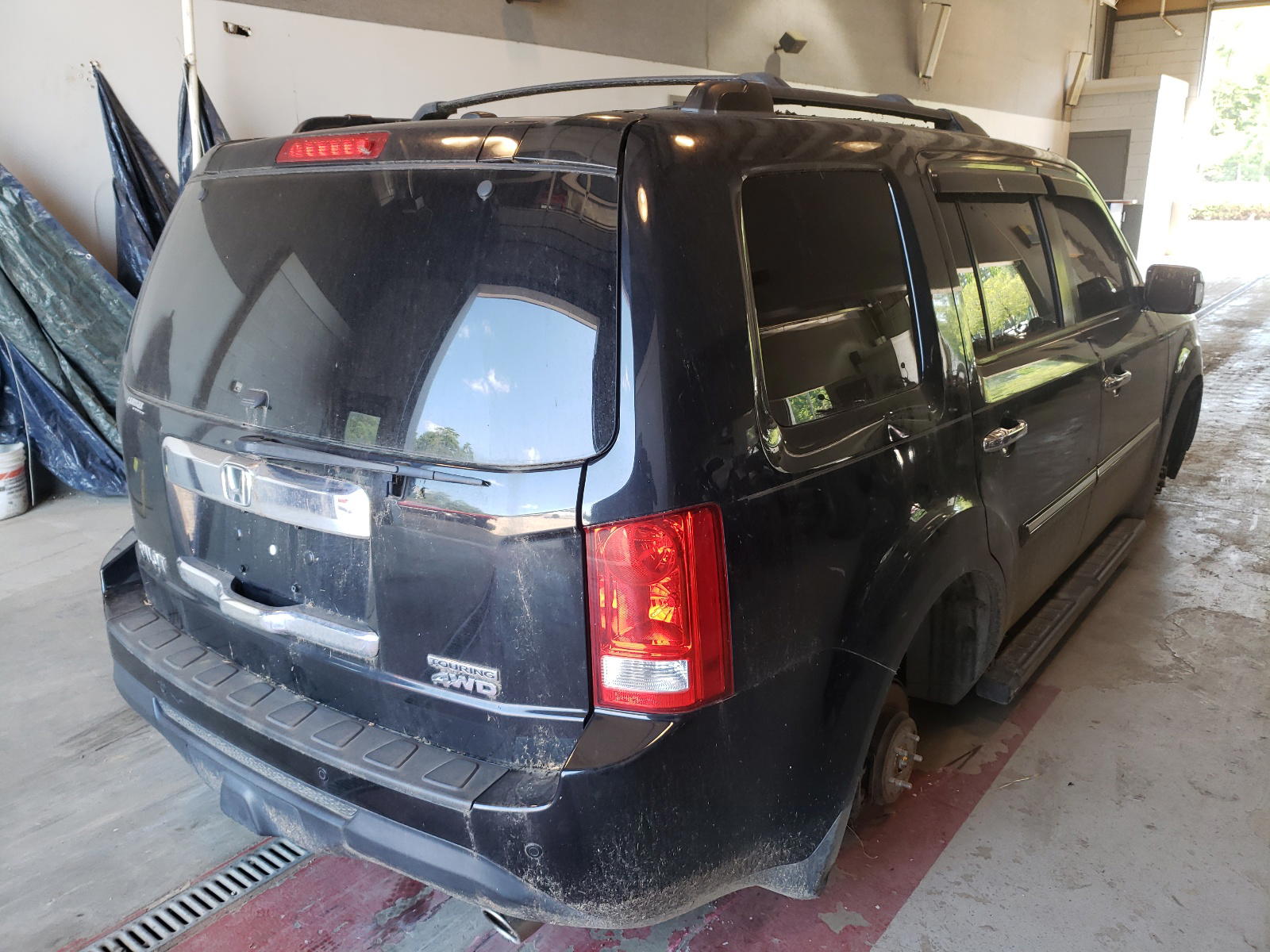 Photo 4 from auction – 2013 HONDA PILOT TOUR with VIN 5FNYF4H95DB018741