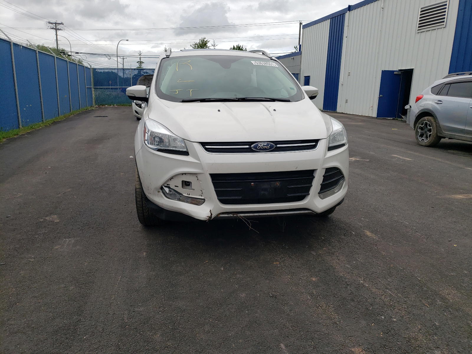 Photo 20 from auction – 2014 FORD ESCAPE TIT with VIN 1FMCU9J9XEUC71288