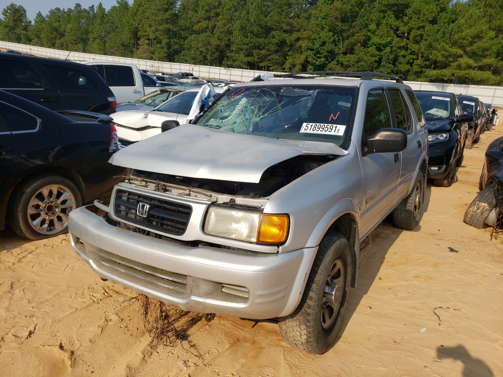 Photo 2 from auction – 1999 HONDA PASSPORT E with VIN 4S6CK58W0X4408517
