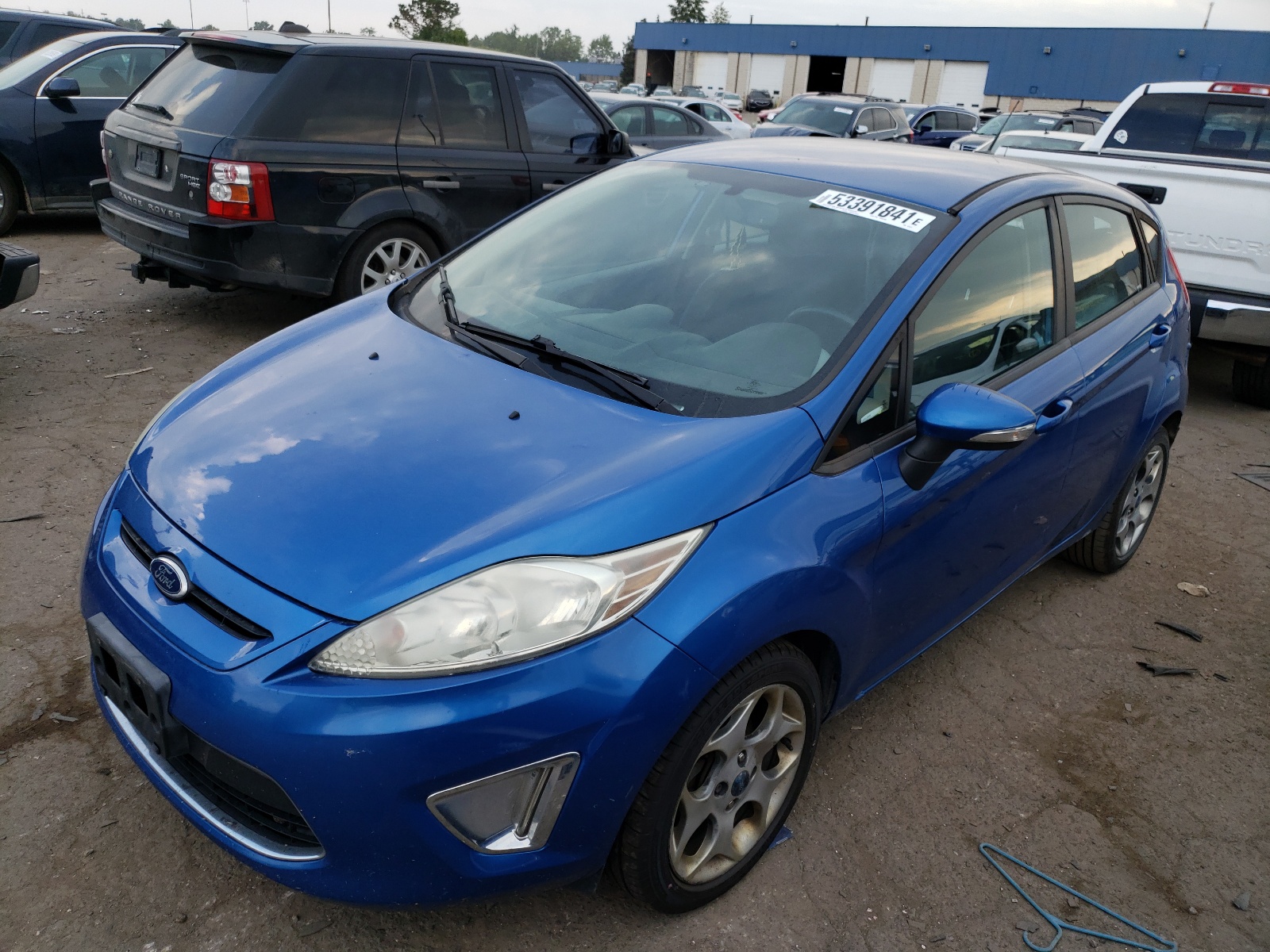Photo 2 from auction – 2011 FORD FIESTA SES with VIN 3FADP4FJ6BM108813