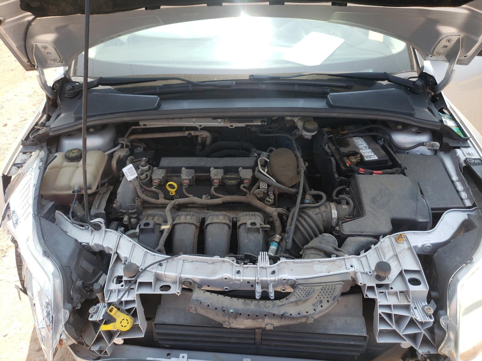 Photo 7 from auction – 2014 FORD FOCUS S with VIN 1FADP3E2XEL175411