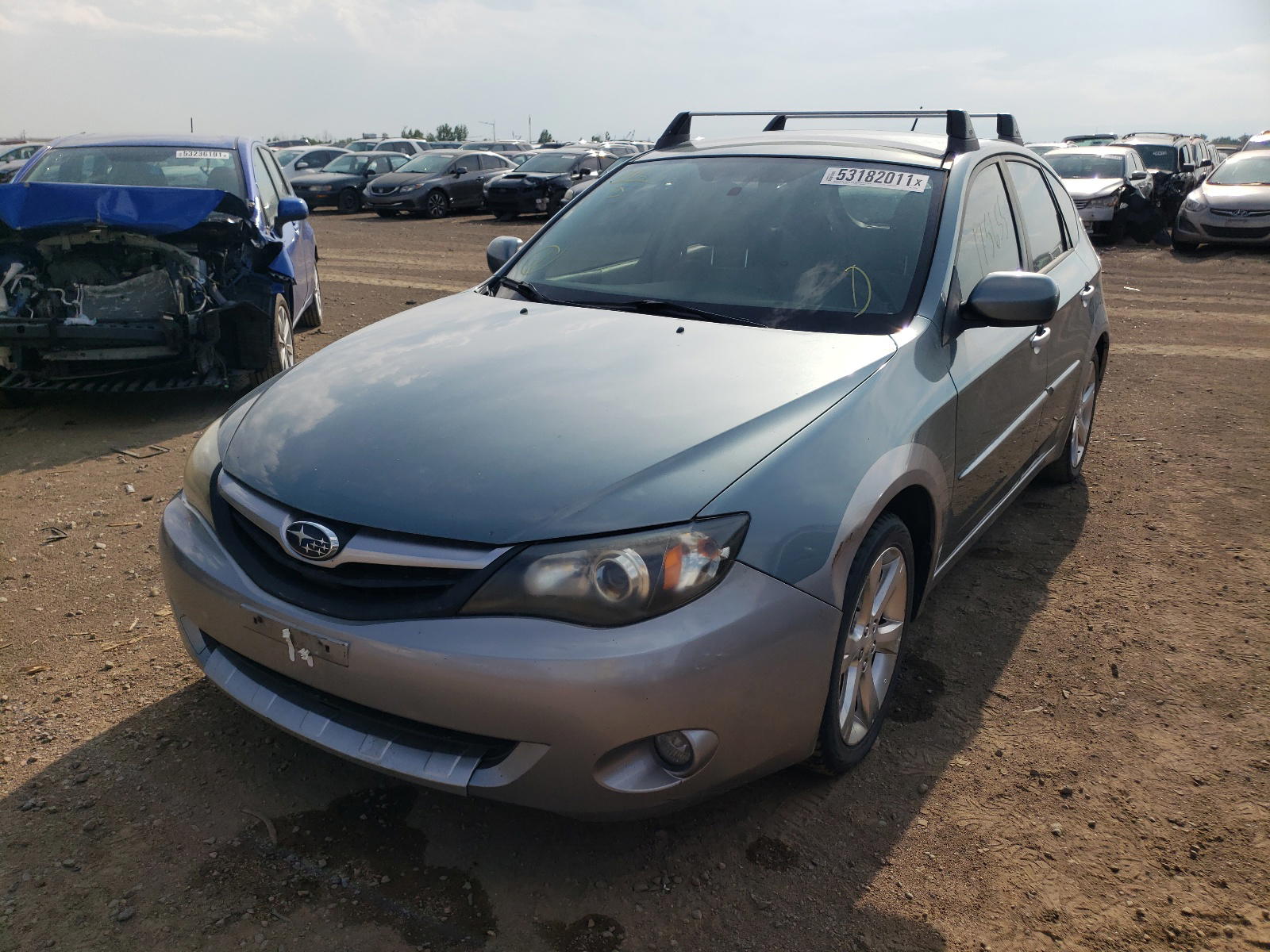 Photo 2 from auction – 2010 SUBARU IMPREZA OU with VIN JF1GH6D63AG810410