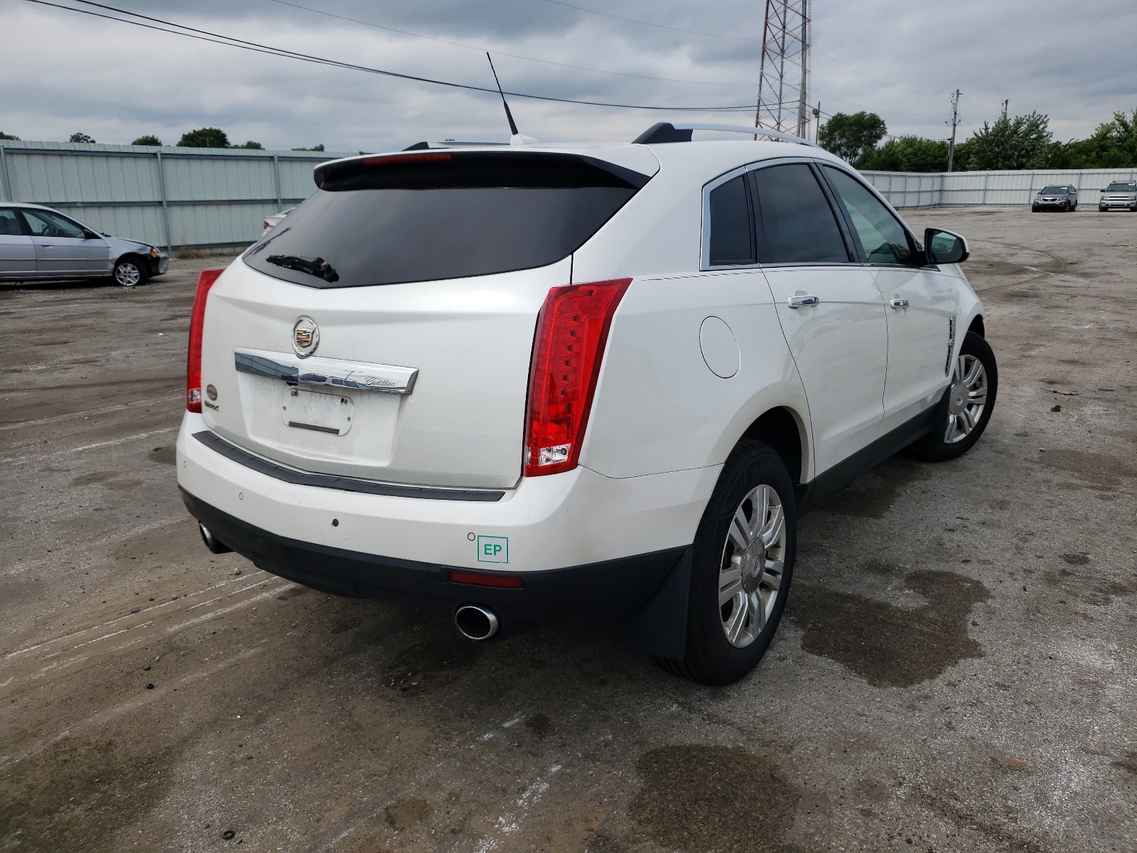 Photo 4 from auction – 2011 CADILLAC SRX LUXURY with VIN 3GYFNAEY5BS553829