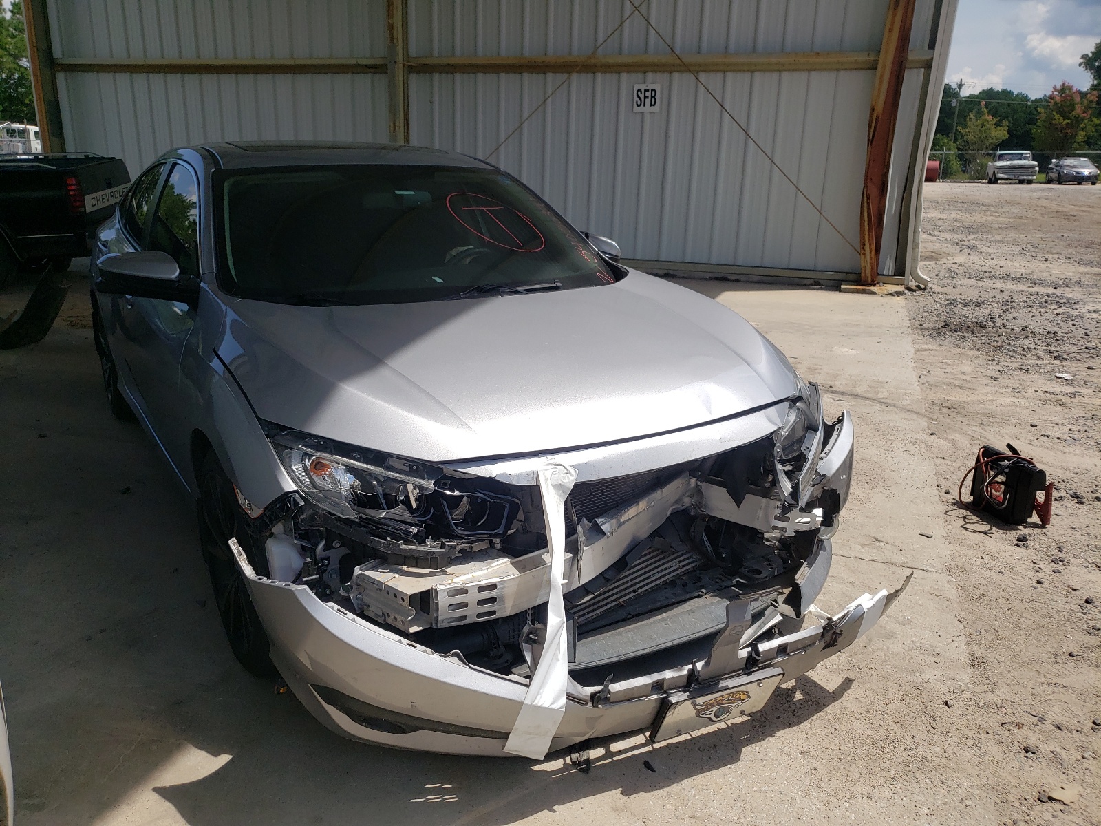 HONDA CIVIC EXL 2017 with VIN 2HGFC1F75HH658773 - Photo from auction