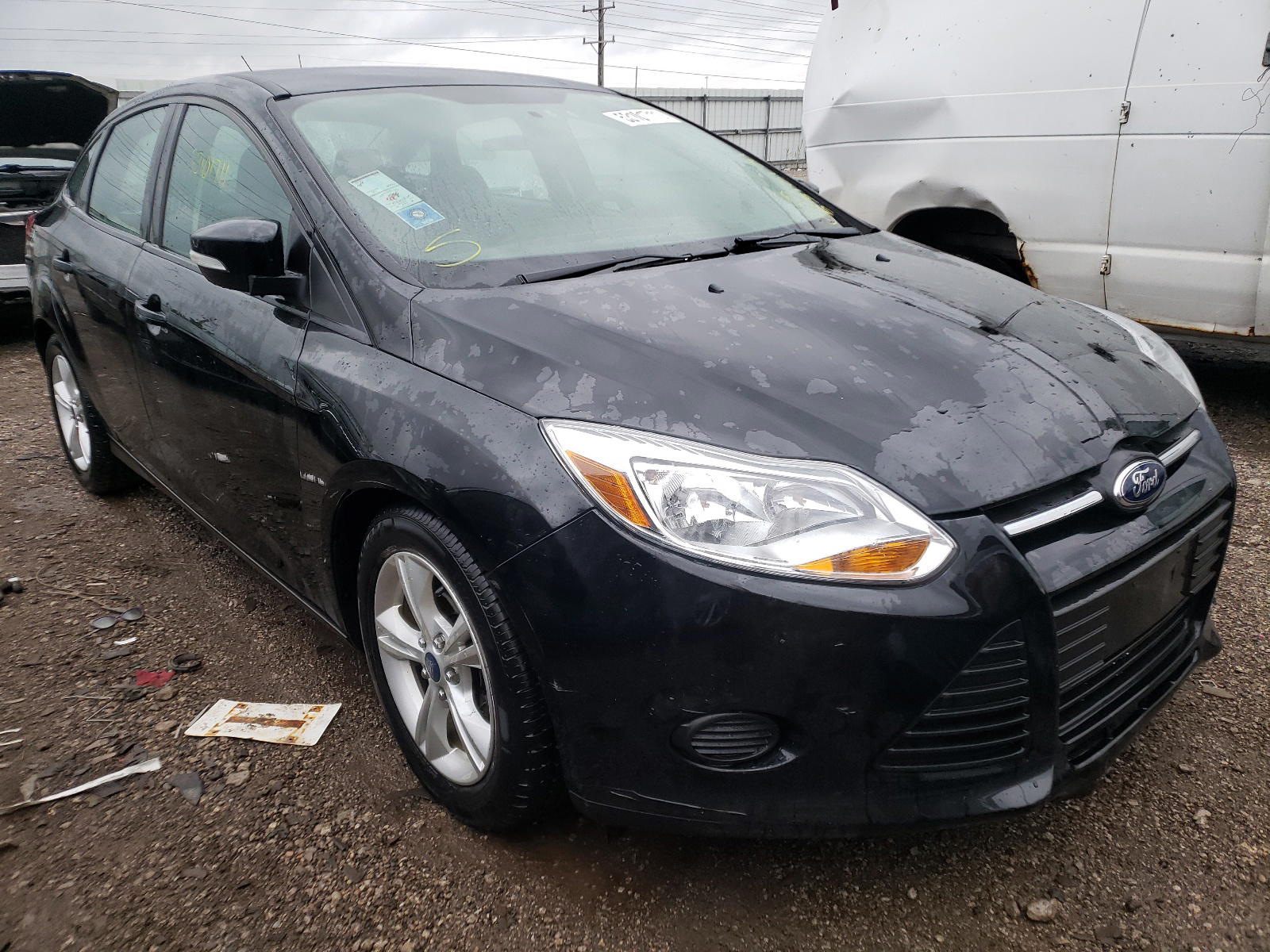 FORD FOCUS SE 2014 with VIN 1FADP3F22EL427523 - Photo from auction