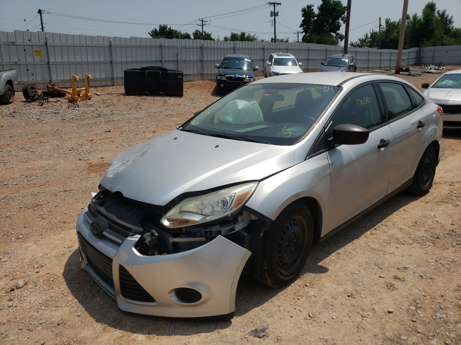 Photo 2 from auction – 2014 FORD FOCUS S with VIN 1FADP3E2XEL175411