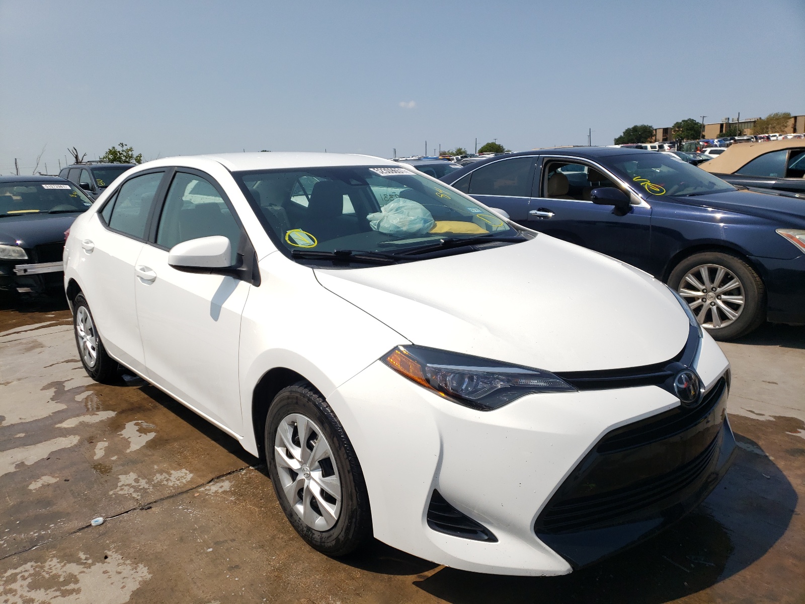 TOYOTA COROLLA L 2018 with VIN 5YFBURHE6JP780790 - Photo from auction