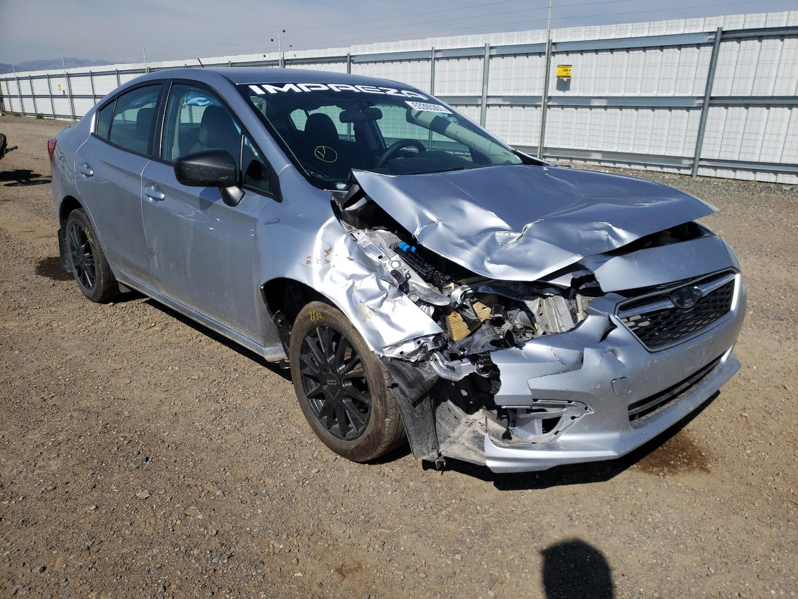 SUBARU IMPREZA 2019 with VIN 4S3GKAA66K1604831 - Photo from auction