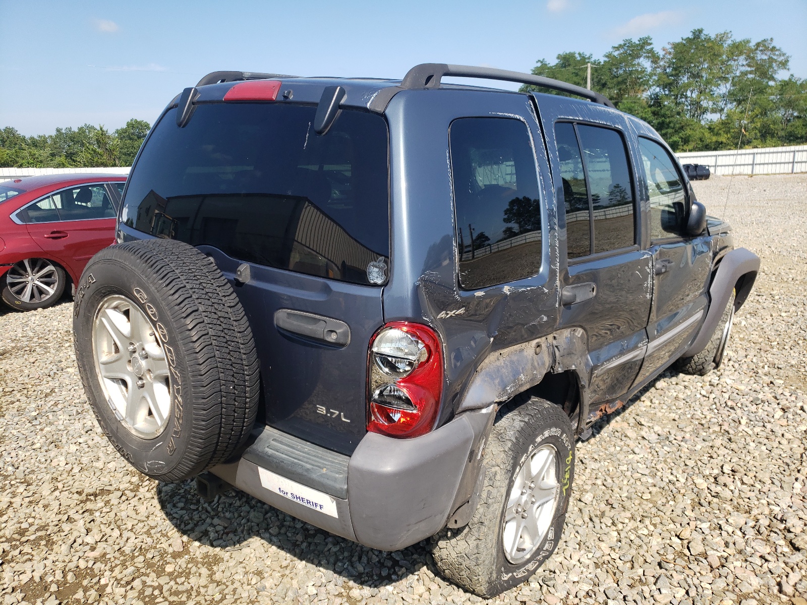 Photo 4 from auction – 2002 JEEP LIBERTY SP with VIN 1J4GL48K22W256637