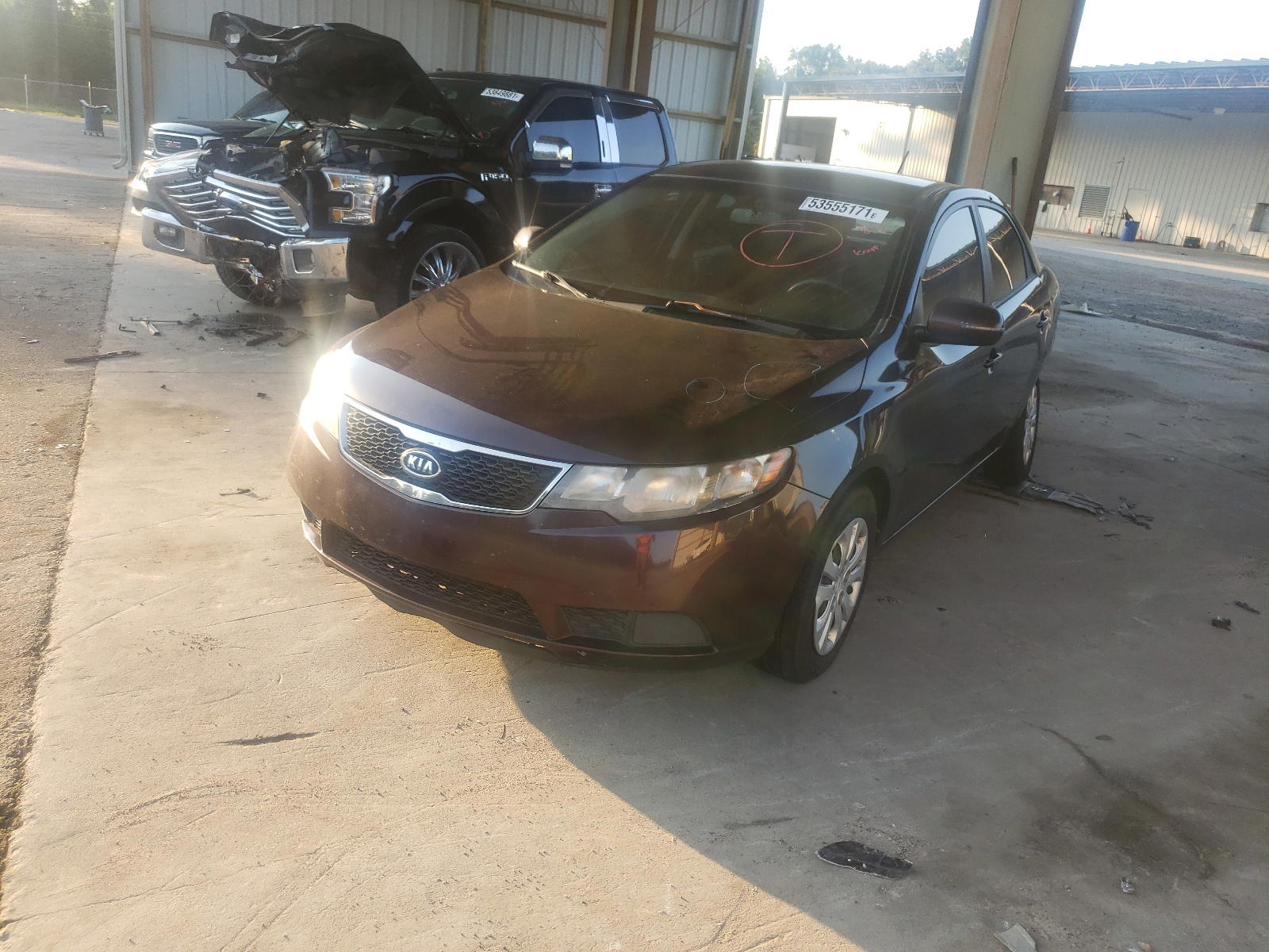 Photo 2 from auction – 2011 KIA FORTE EX with VIN KNAFU4A21B5463595