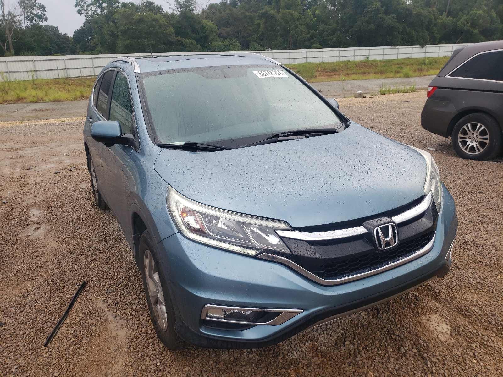 HONDA CR-V EXL 2015 with VIN 2HKRM3H79FH524240 - Photo from auction