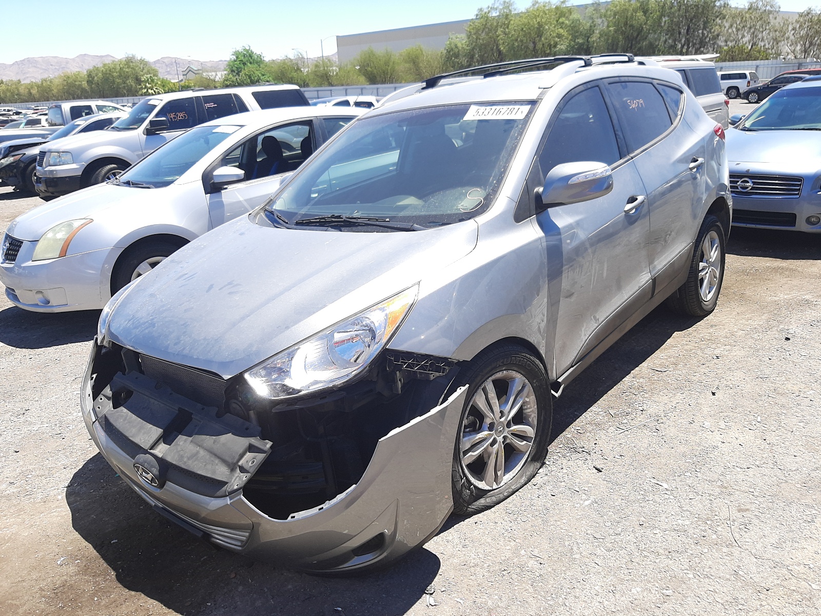 Photo 2 from auction – 2012 HYUNDAI TUCSON GLS with VIN KM8JU3AC3CU357443