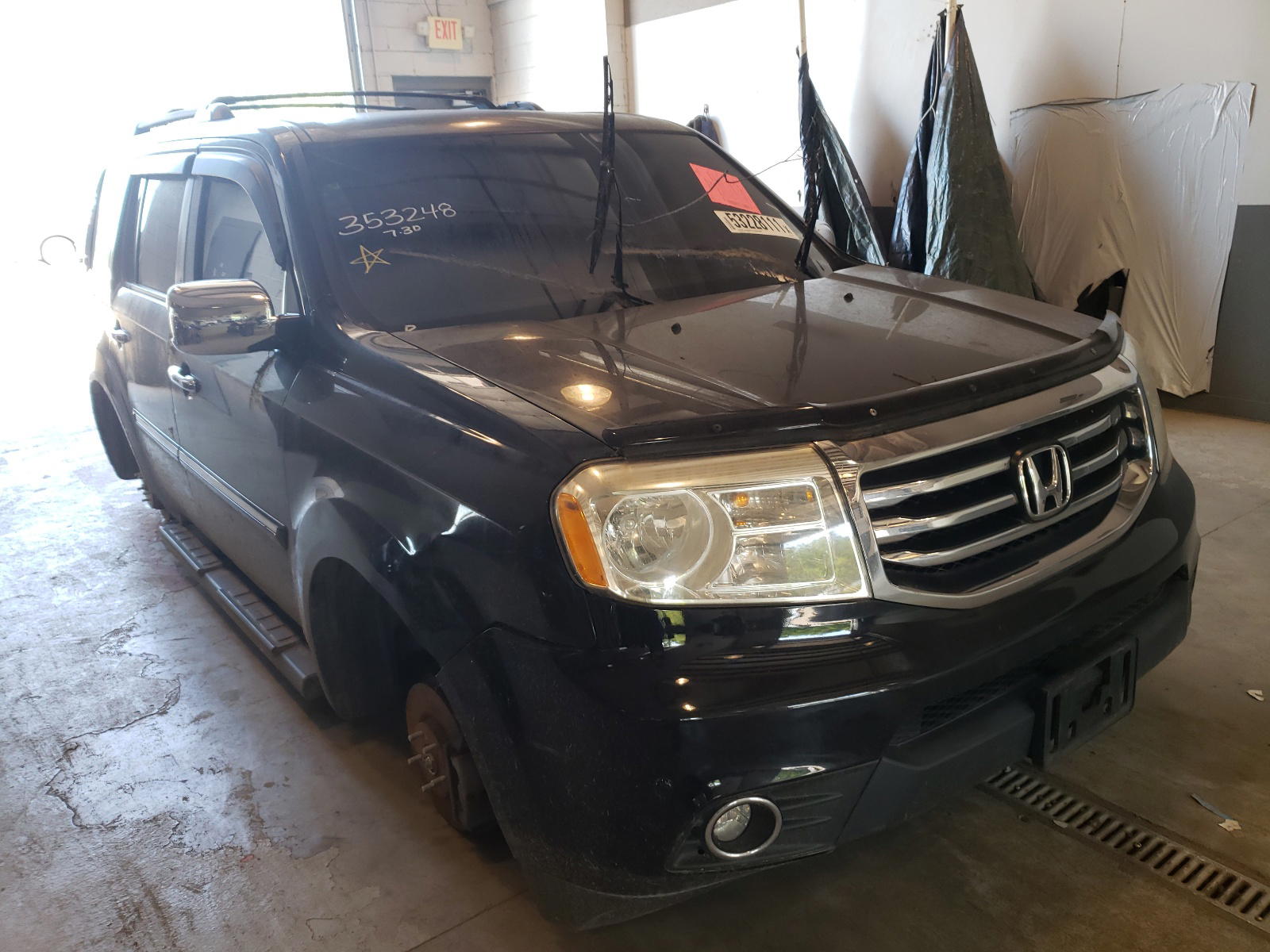 HONDA PILOT TOUR 2013 with VIN 5FNYF4H95DB018741 - Photo from auction