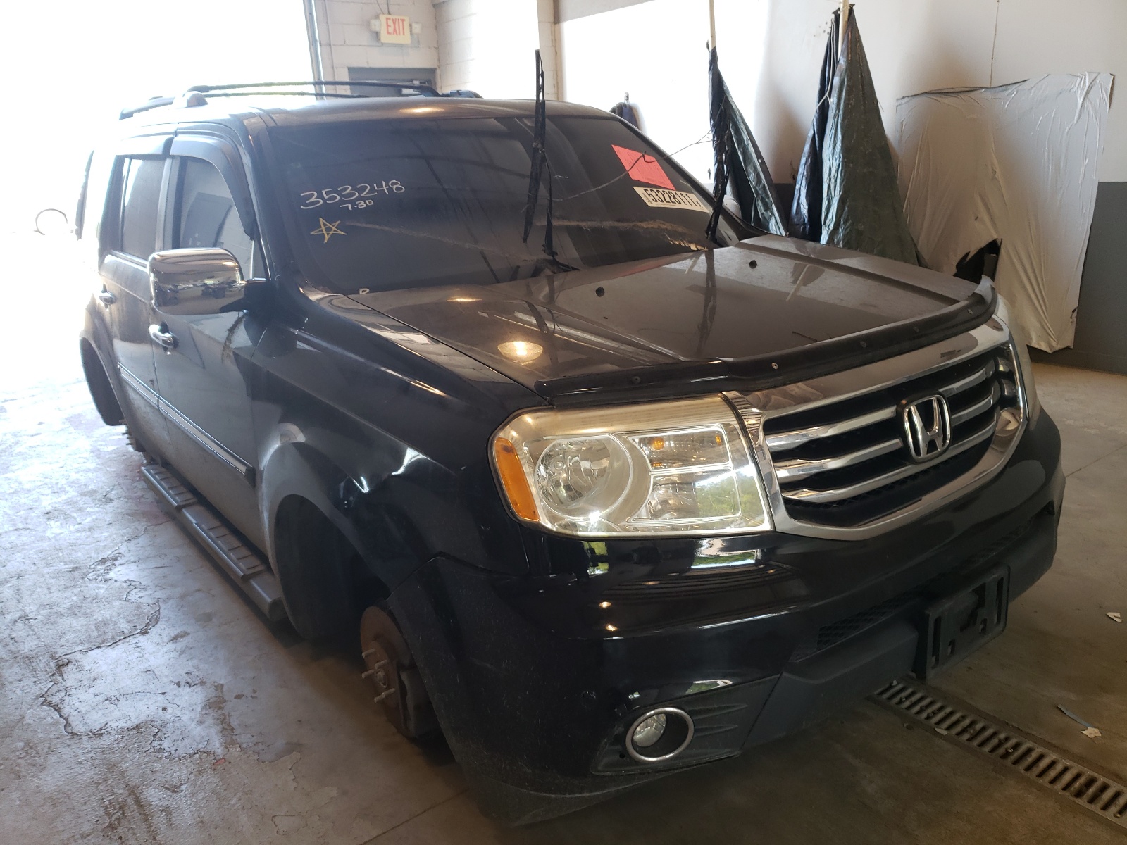Zdjęcie 1 z aukcji – 2013 HONDA PILOT TOUR z VIN 5FNYF4H95DB018741