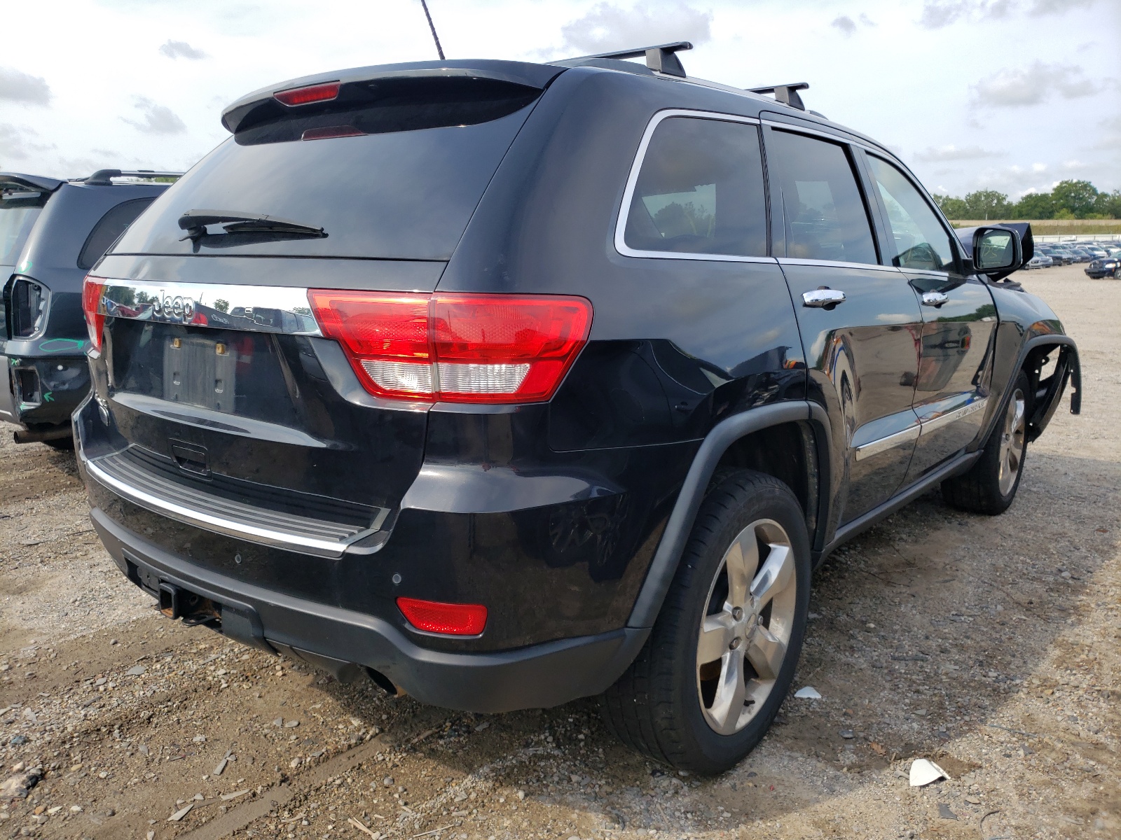 Photo 4 from auction – 2012 JEEP GRAND CHER with VIN 1C4RJFCT1CC184624