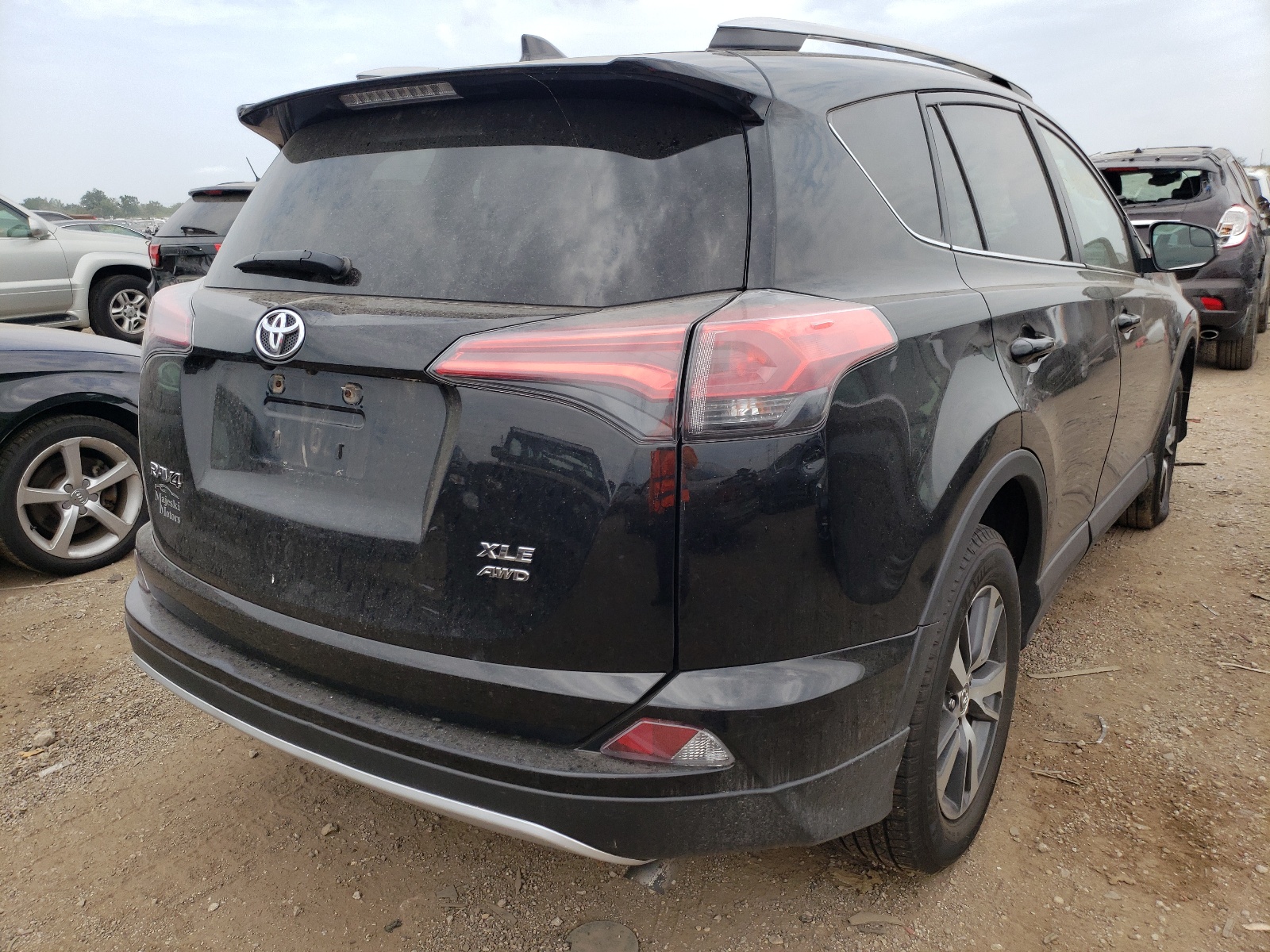 Photo 4 from auction – 2016 TOYOTA RAV4 XLE with VIN 2T3RFREV5GW443376