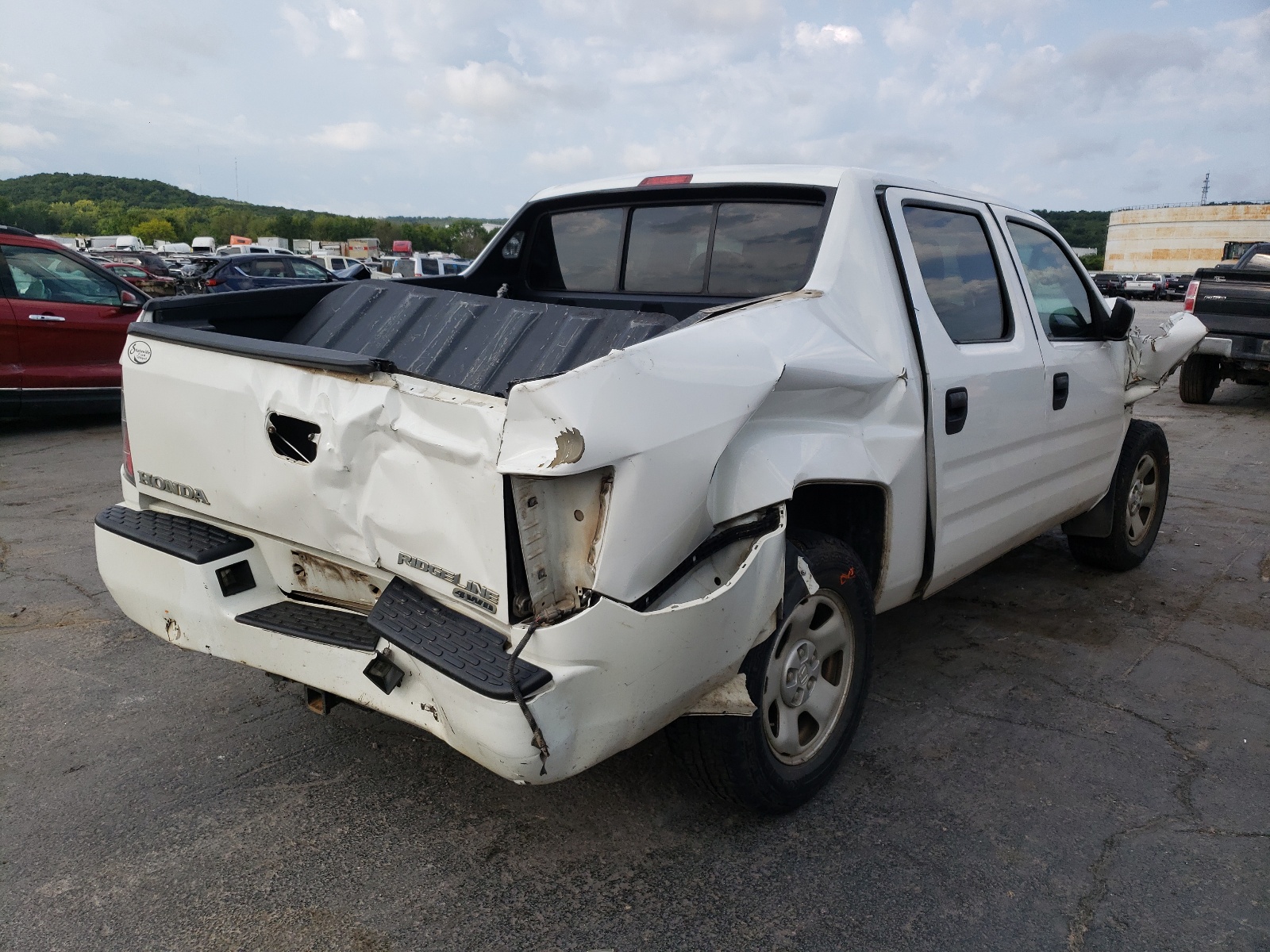 Photo 4 from auction – 2006 HONDA RIDGELINE with VIN 2HJYK16276H552980