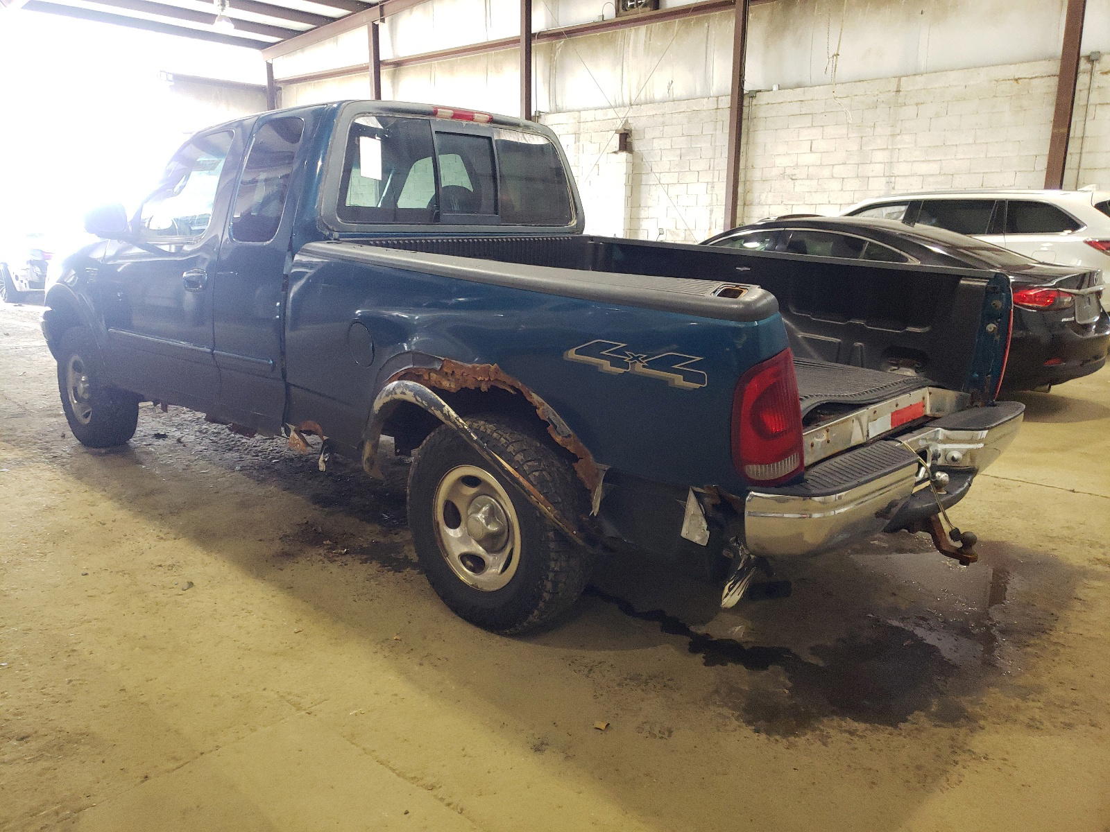 Photo 3 from auction – 2000 FORD F150 with VIN 1FTRX18LXYNA49065