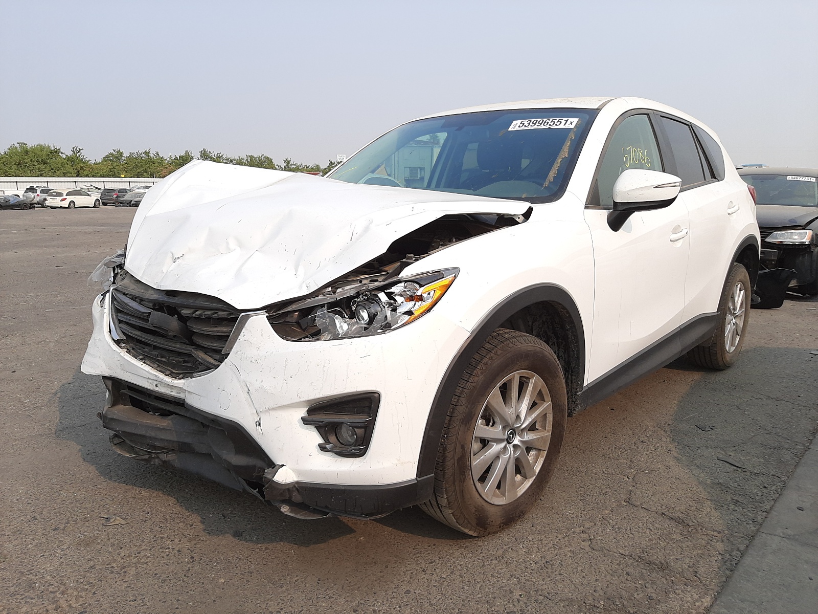 Photo 2 from auction – 2016 MAZDA CX-5 TOURI with VIN JM3KE4CY3G0910648