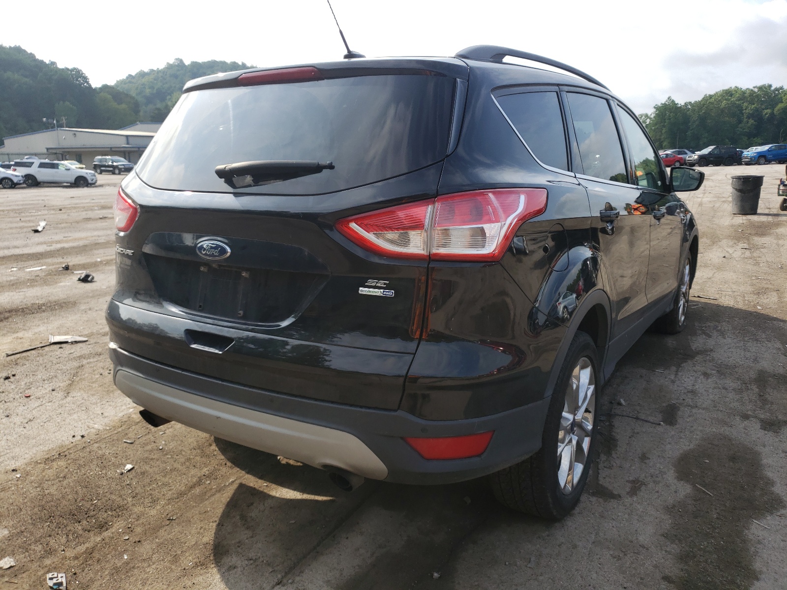 Photo 4 from auction – 2016 FORD ESCAPE SE with VIN 1FMCU9G96GUB92128