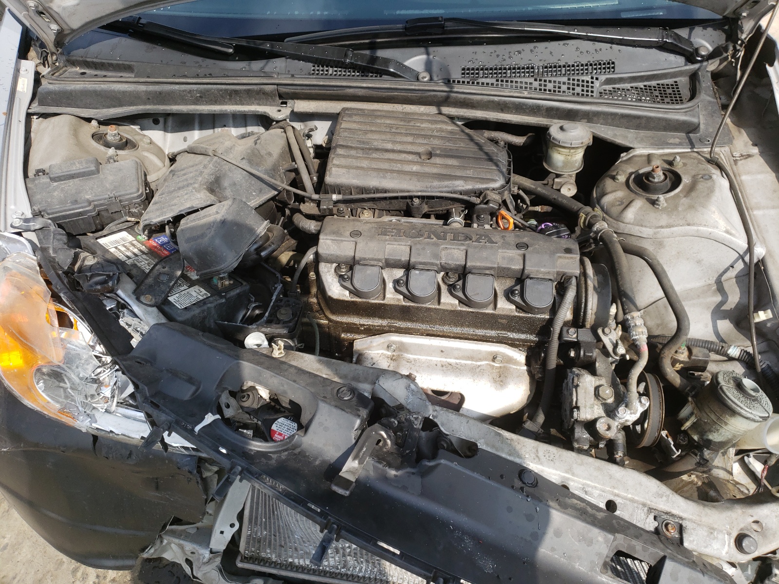 Photo 7 from auction – 2002 HONDA CIVIC DX with VIN 2HGES16142H595876