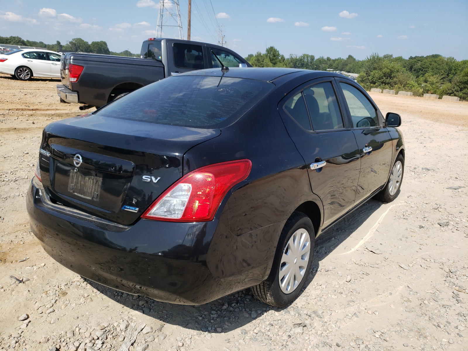 Photo 4 from auction – 2012 NISSAN VERSA S with VIN 3N1CN7AP9CL804407