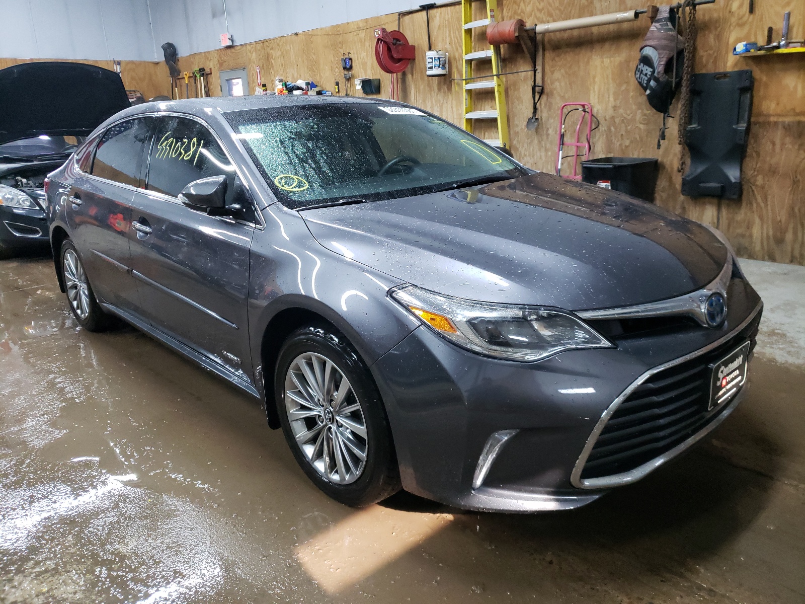 TOYOTA AVALON HYB 2016 with VIN 4T1BD1EB5GU054616 - Photo from auction