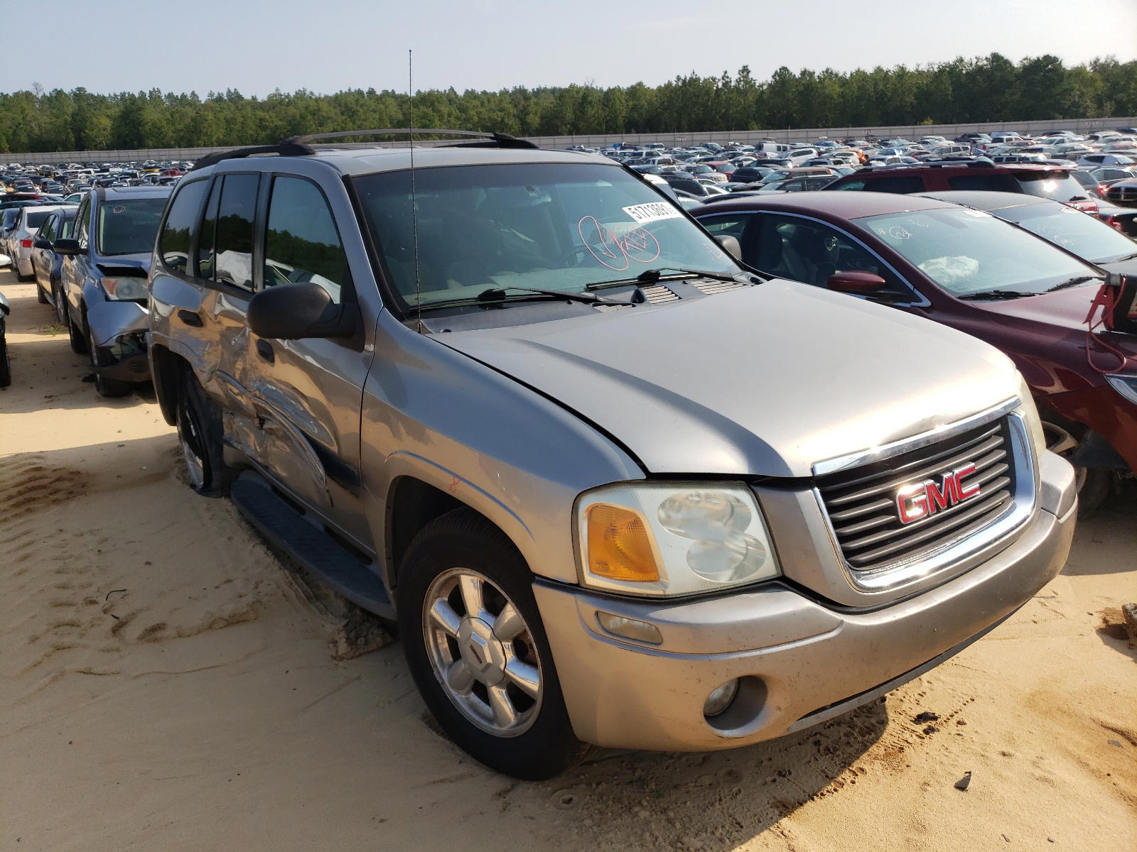 GMC ENVOY 2003 with VIN 1GKDS13S732133303 - Photo from auction