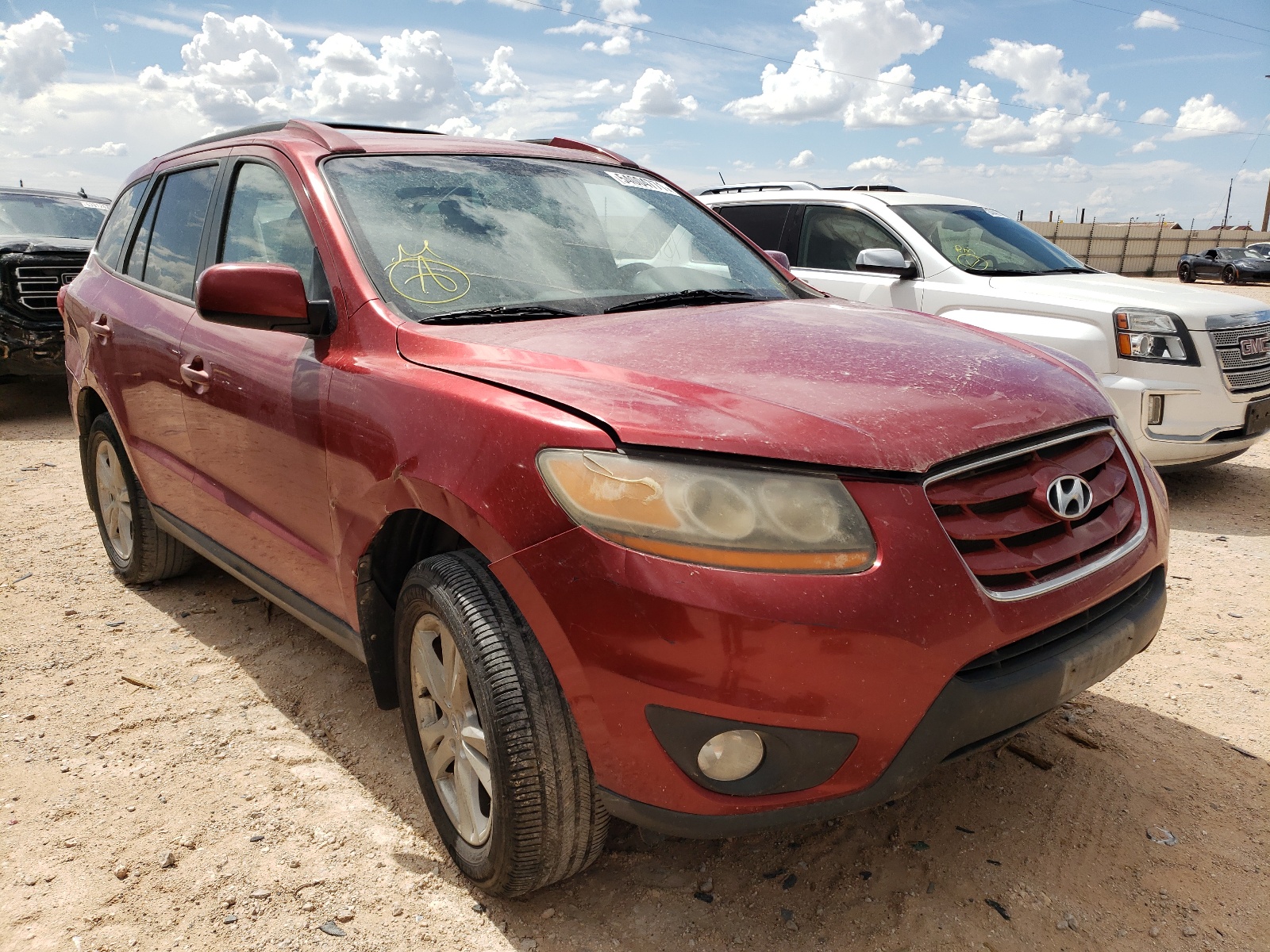 HYUNDAI SANTA FE 2010 with VIN 5NMSHDAG4AH338622 - Photo from auction