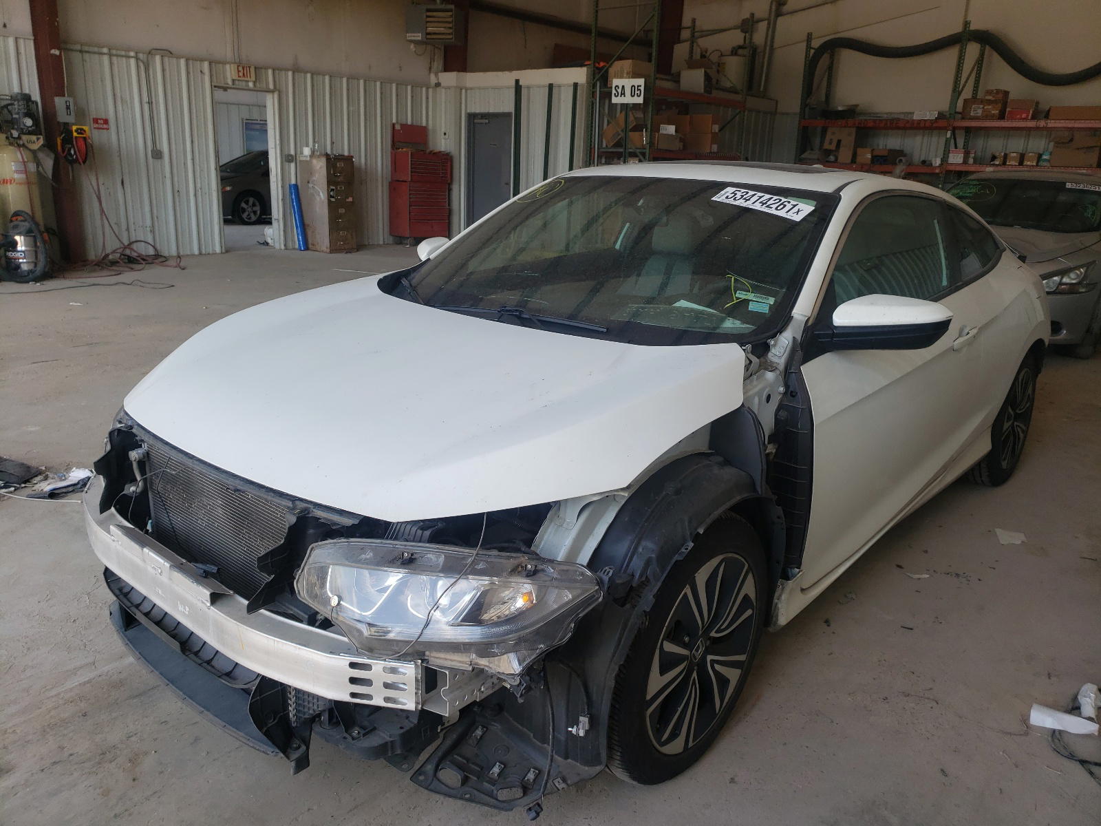 Photo 2 from auction – 2016 HONDA CIVIC with VIN 2HGFC3B38GH352048