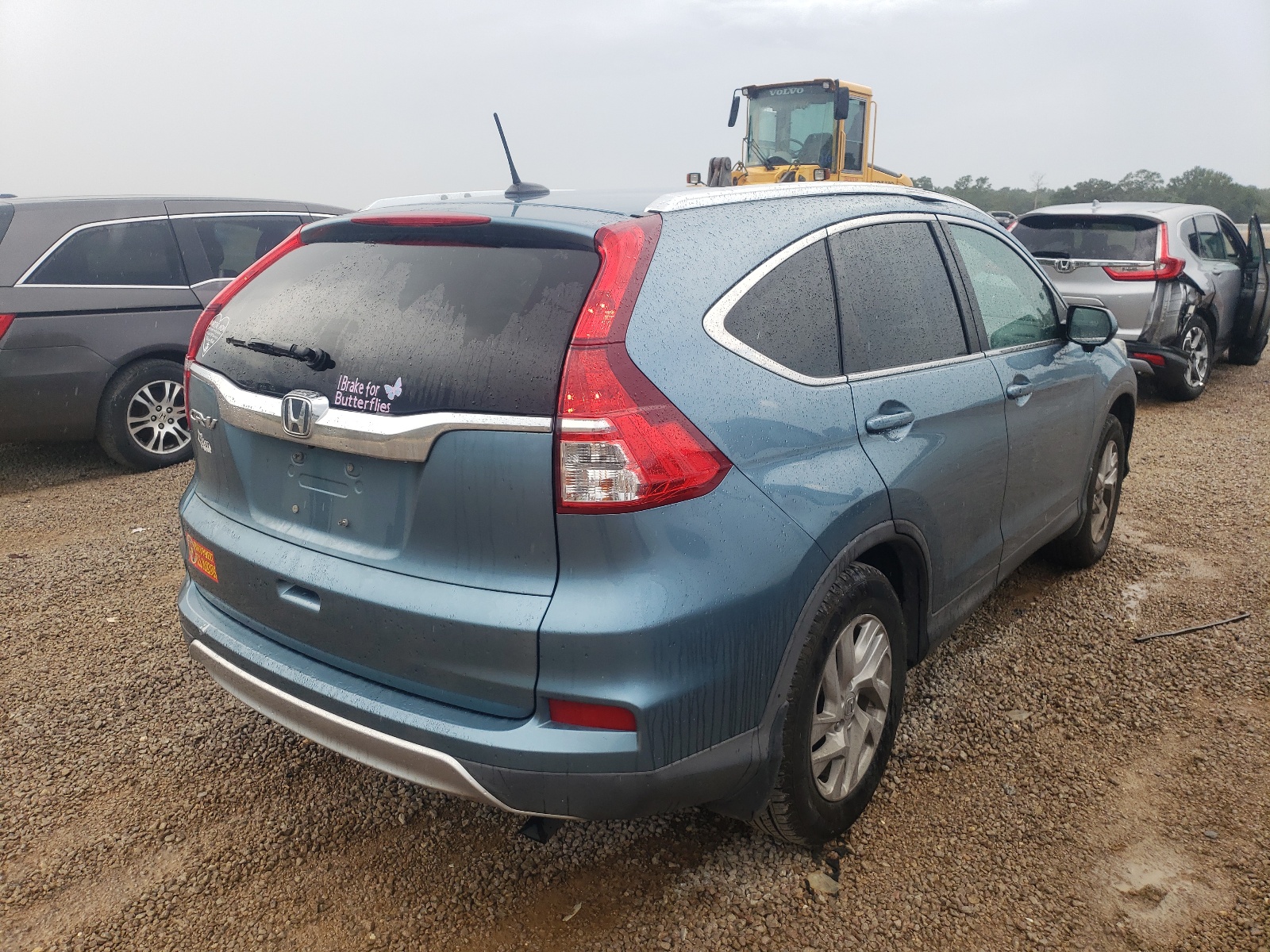Photo 4 from auction – 2015 HONDA CR-V EXL with VIN 2HKRM3H79FH524240