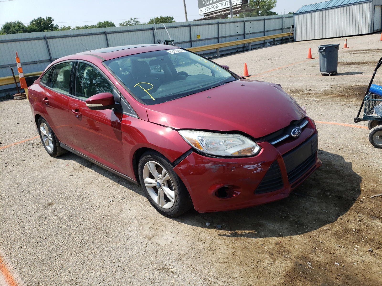 FORD FOCUS SE 2014 with VIN 1FADP3F24EL149434 - Photo from auction