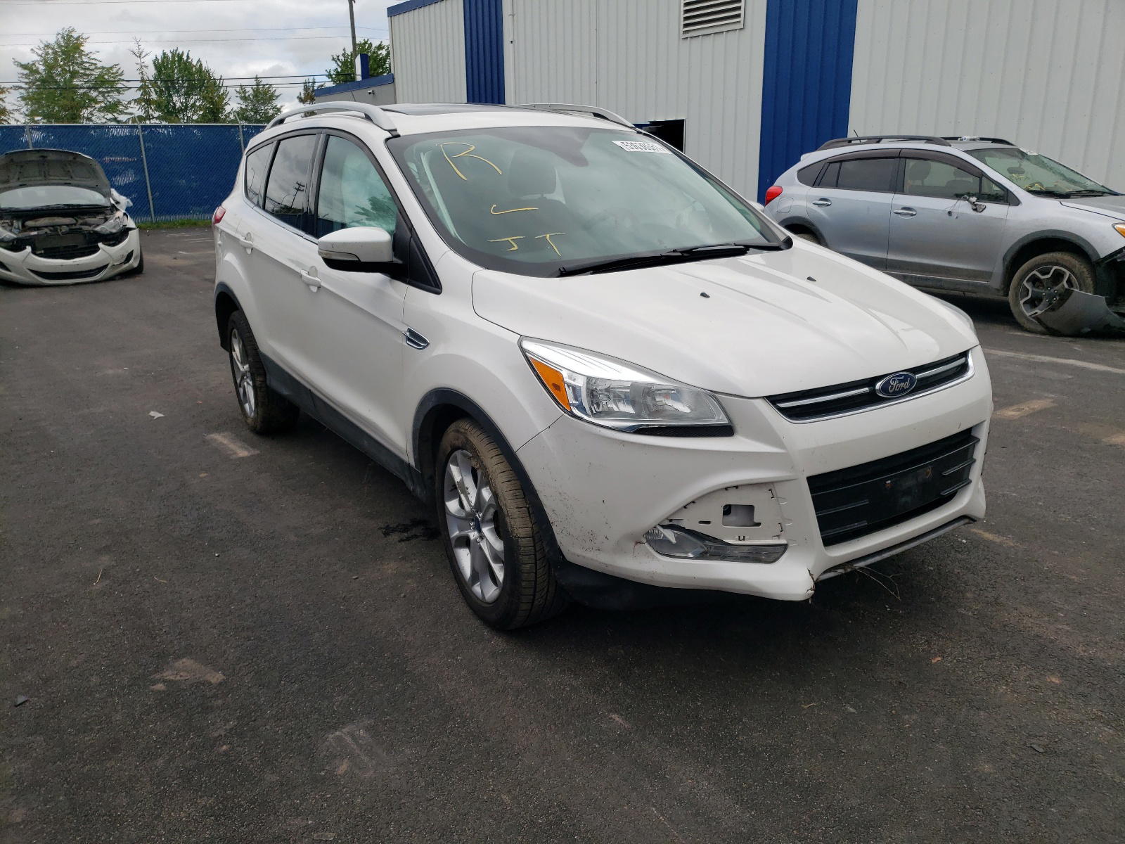 Photo 14 from auction – 2014 FORD ESCAPE TIT with VIN 1FMCU9J9XEUC71288