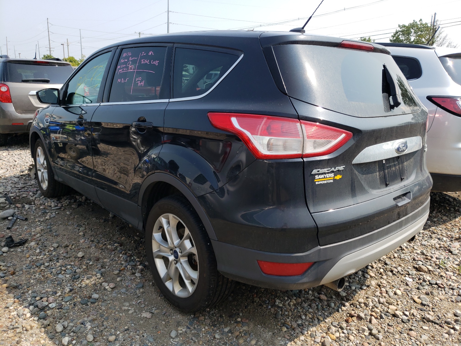 Foto 3 de la subasta – 2013 FORD ESCAPE SEL con VIN 1FMCU9H96DUC56971