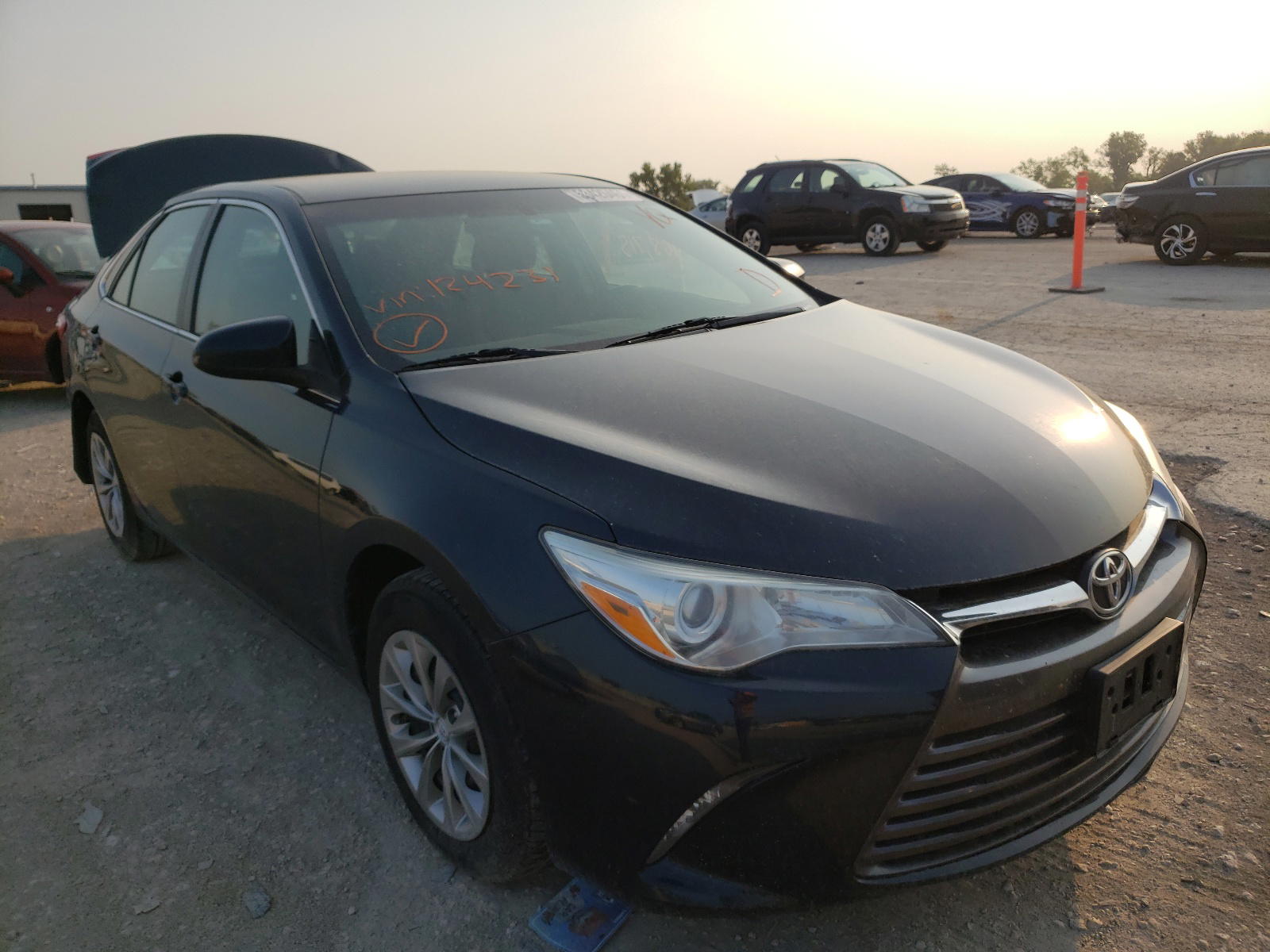 TOYOTA CAMRY LE 2016 with VIN 4T1BF1FK6GU124231 - Photo from auction