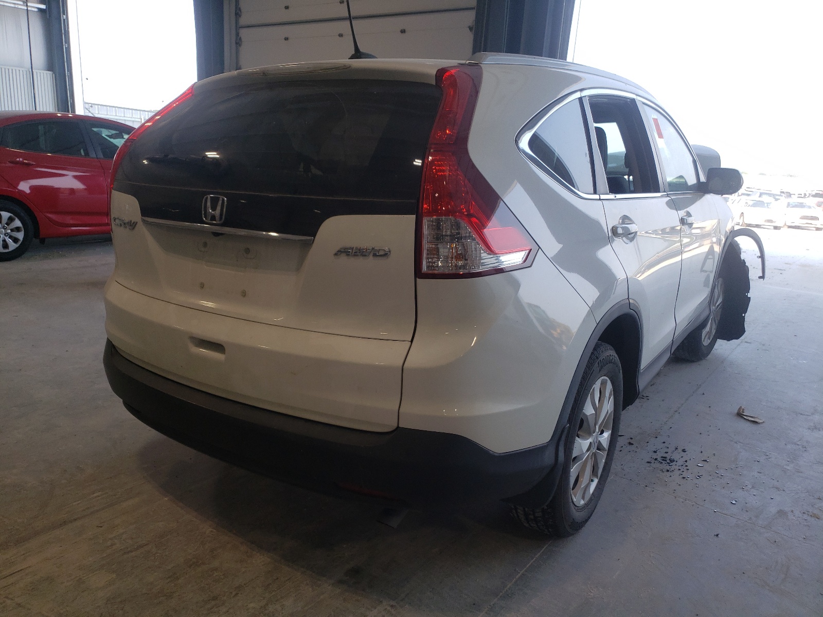 Photo 4 from auction – 2013 HONDA CR-V EXL with VIN 5J6RM4H78DL019902
